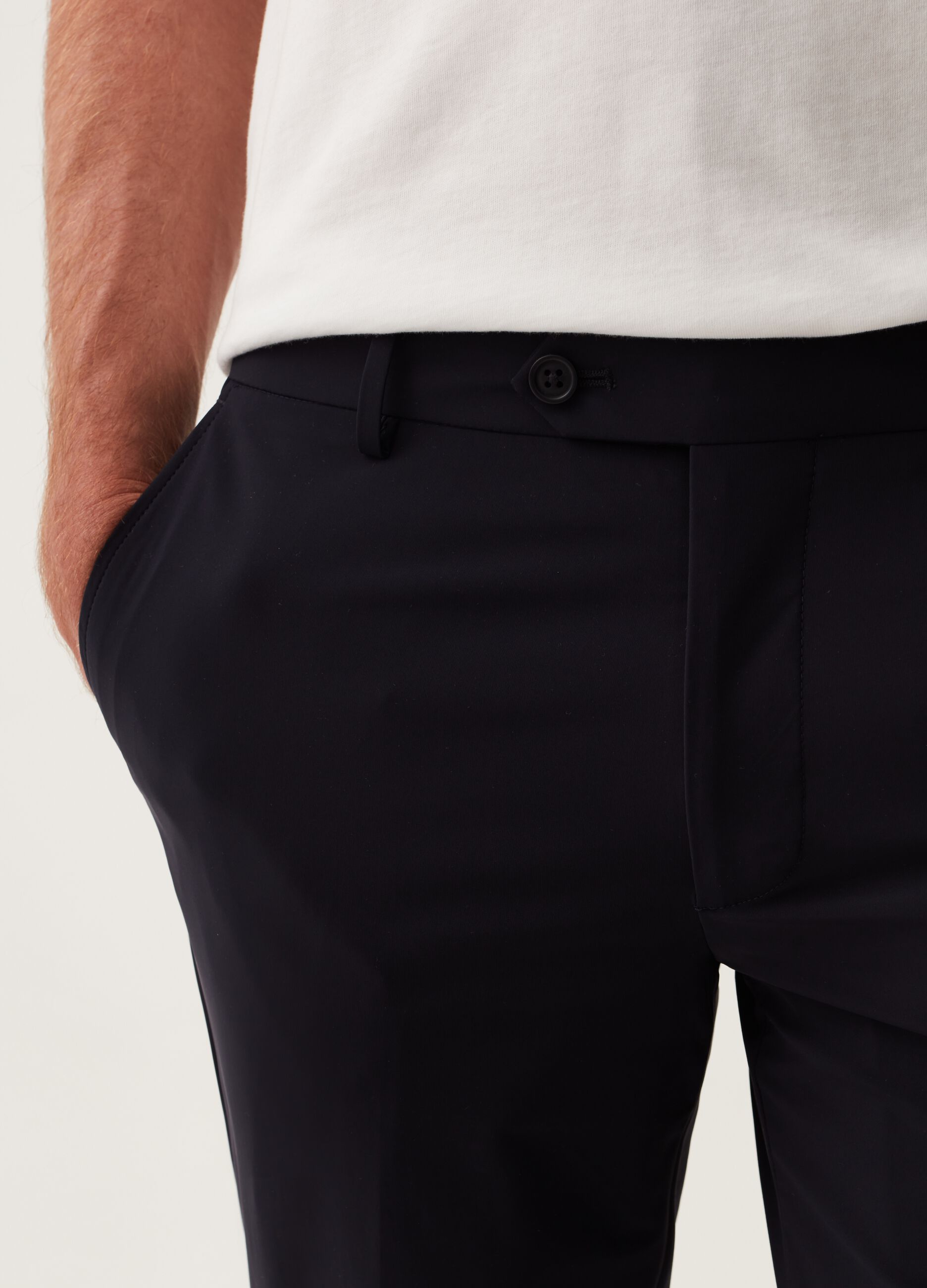 Slim-fit trousers in navy blue technical fabric
