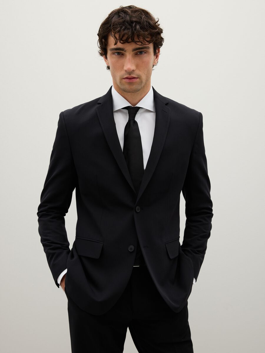 Black slim fit blazer with button closure_0