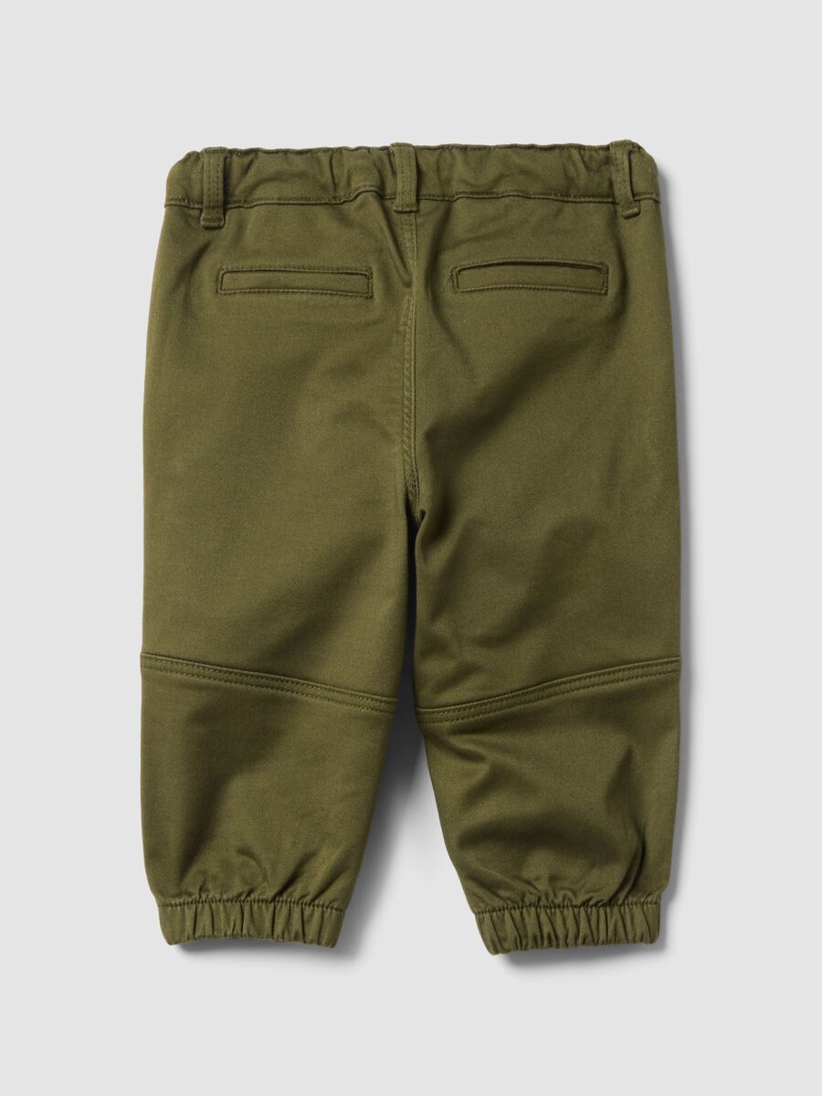Green stretch cotton jogger trousers with drawstring, oversized fit for baby boy_1
