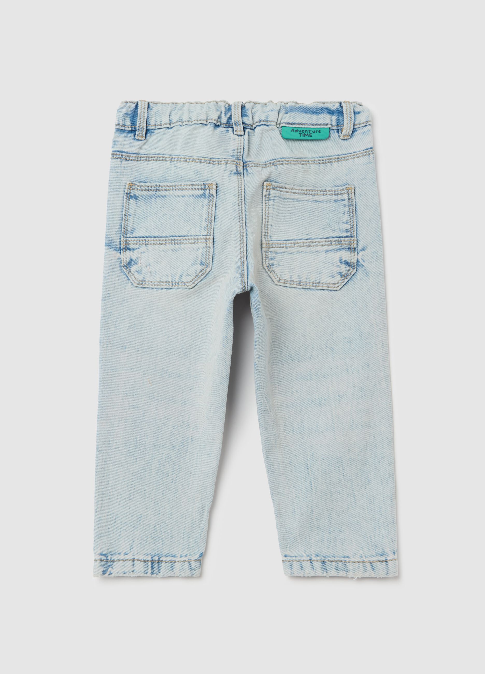 Jeans with five pockets and abrasions