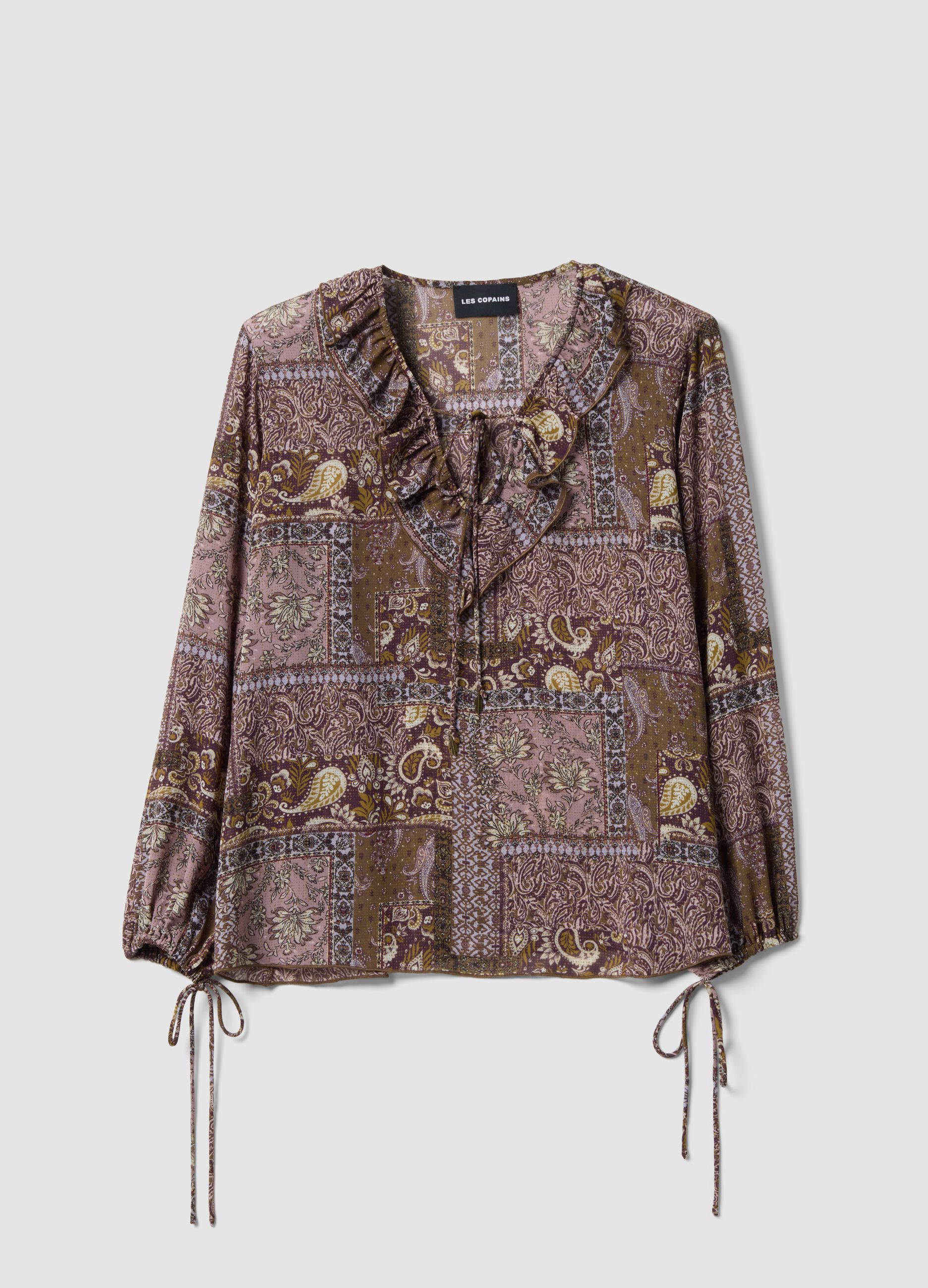 Purple patterned blouse with ruffles and tie neck