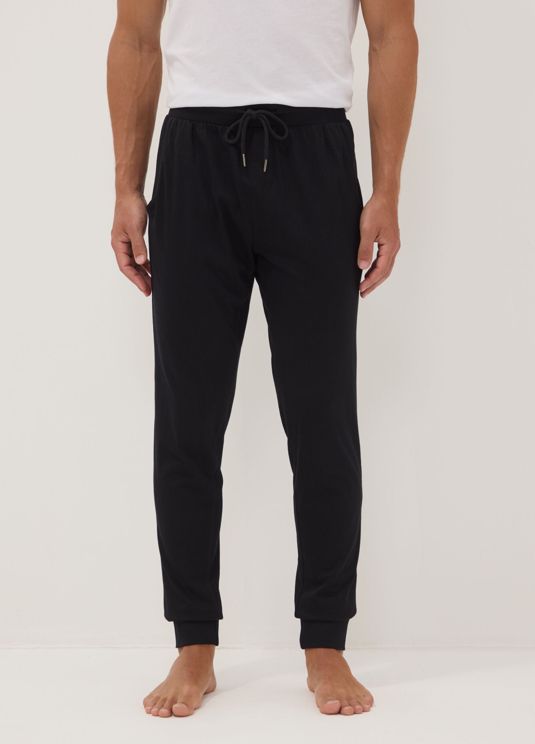 Blue organic cotton pyjama trousers with elasticated waistband