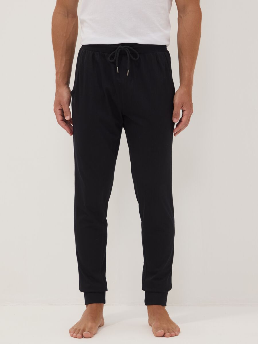 Pantaloni pigiama blu in cotone organico con vita elasticizzata_1