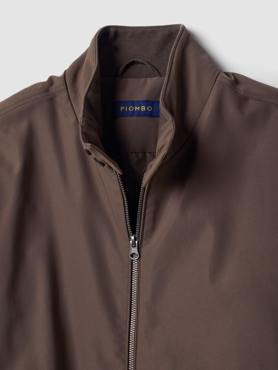 Green padded jacket in a regular fit with zip and high collar_2
