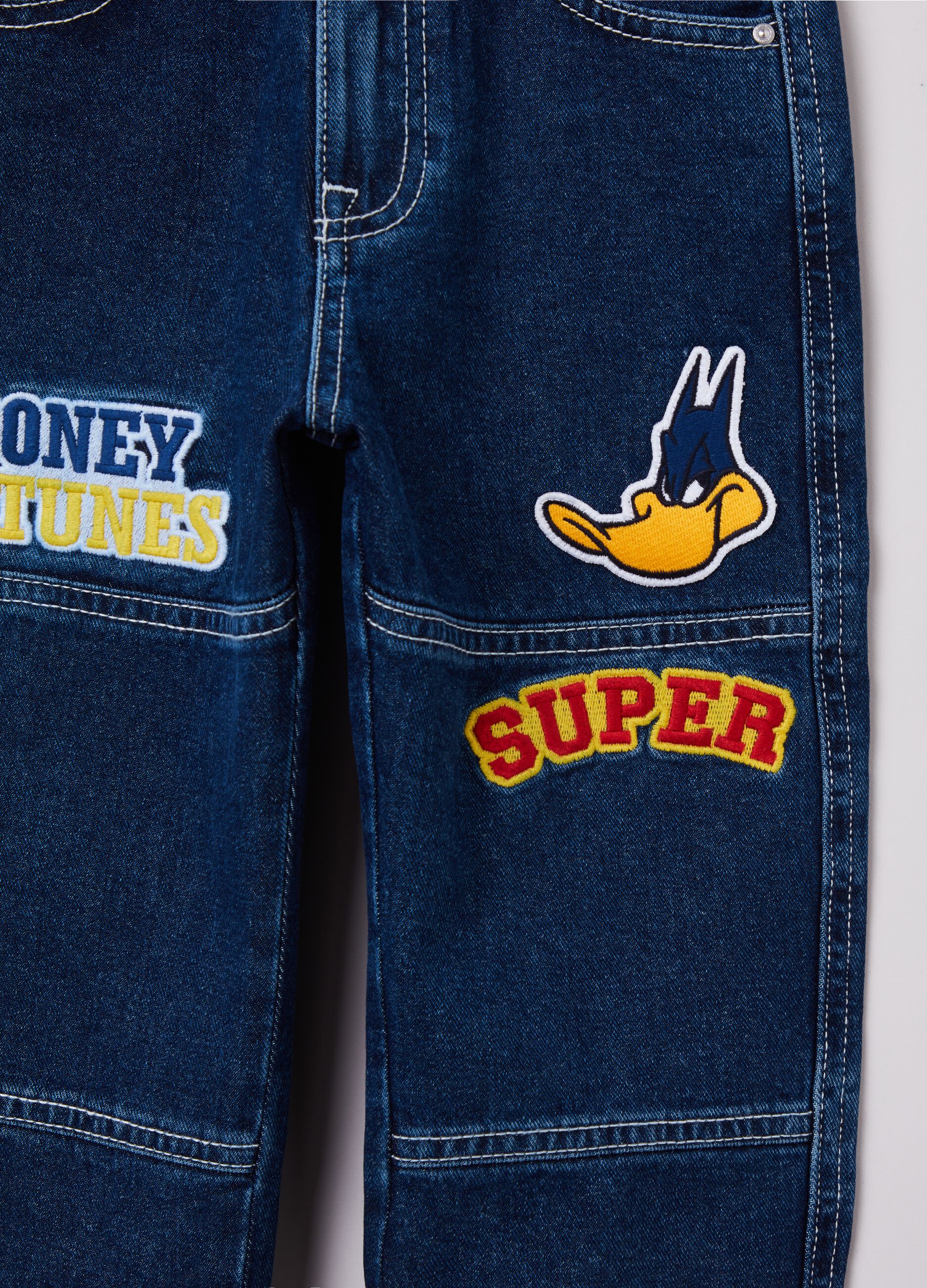 Jeans con patch 100° Anniversario_2
