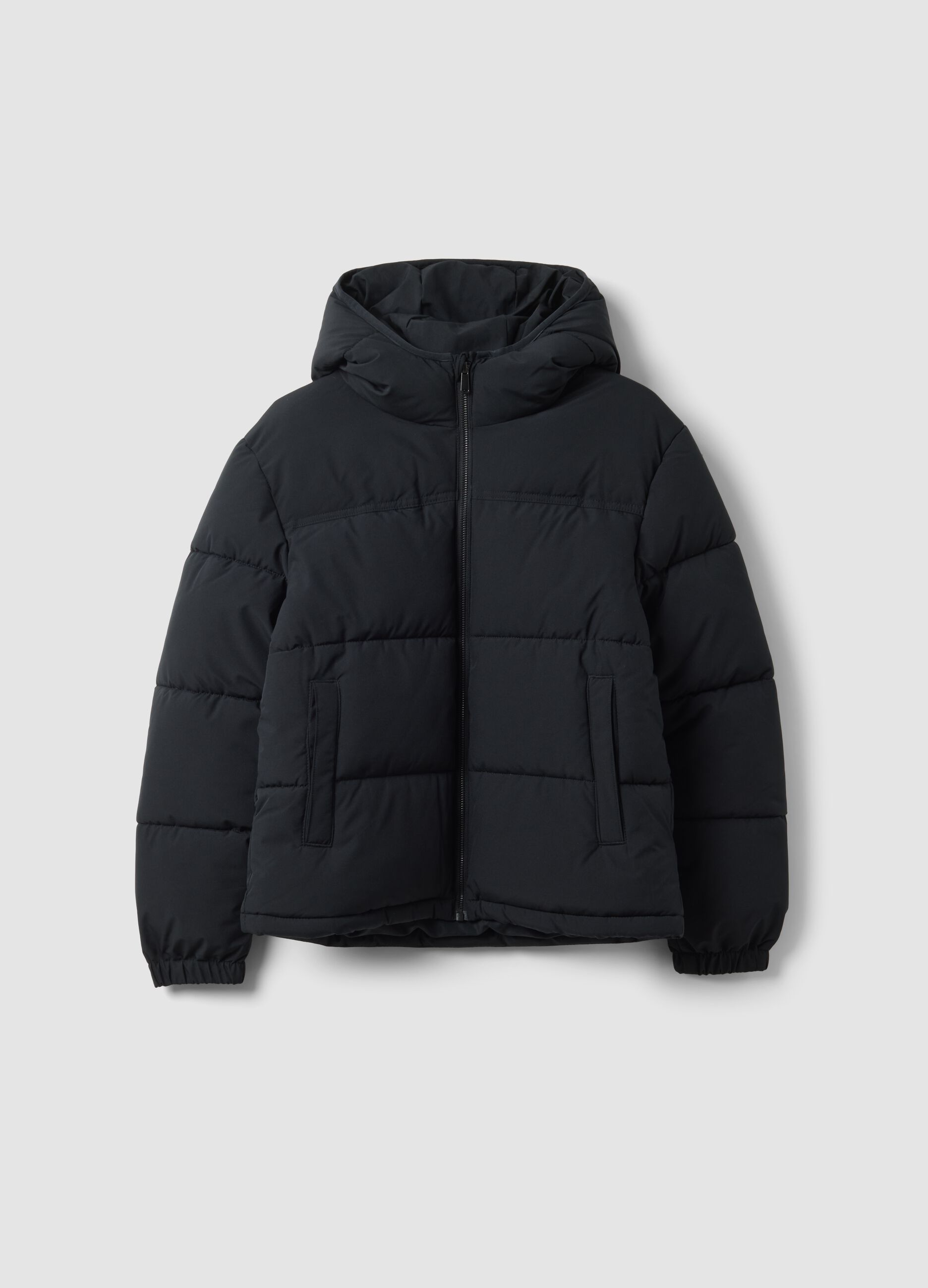 Black padded hooded jacket with water-resistant zip, oversized fit