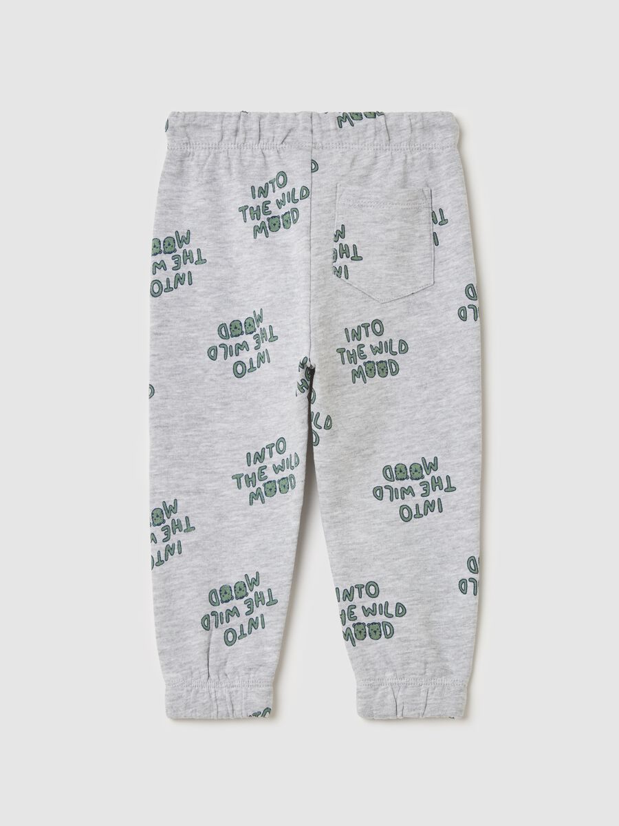 Joggers with elasticated trims and "Into the wild mood” print_1