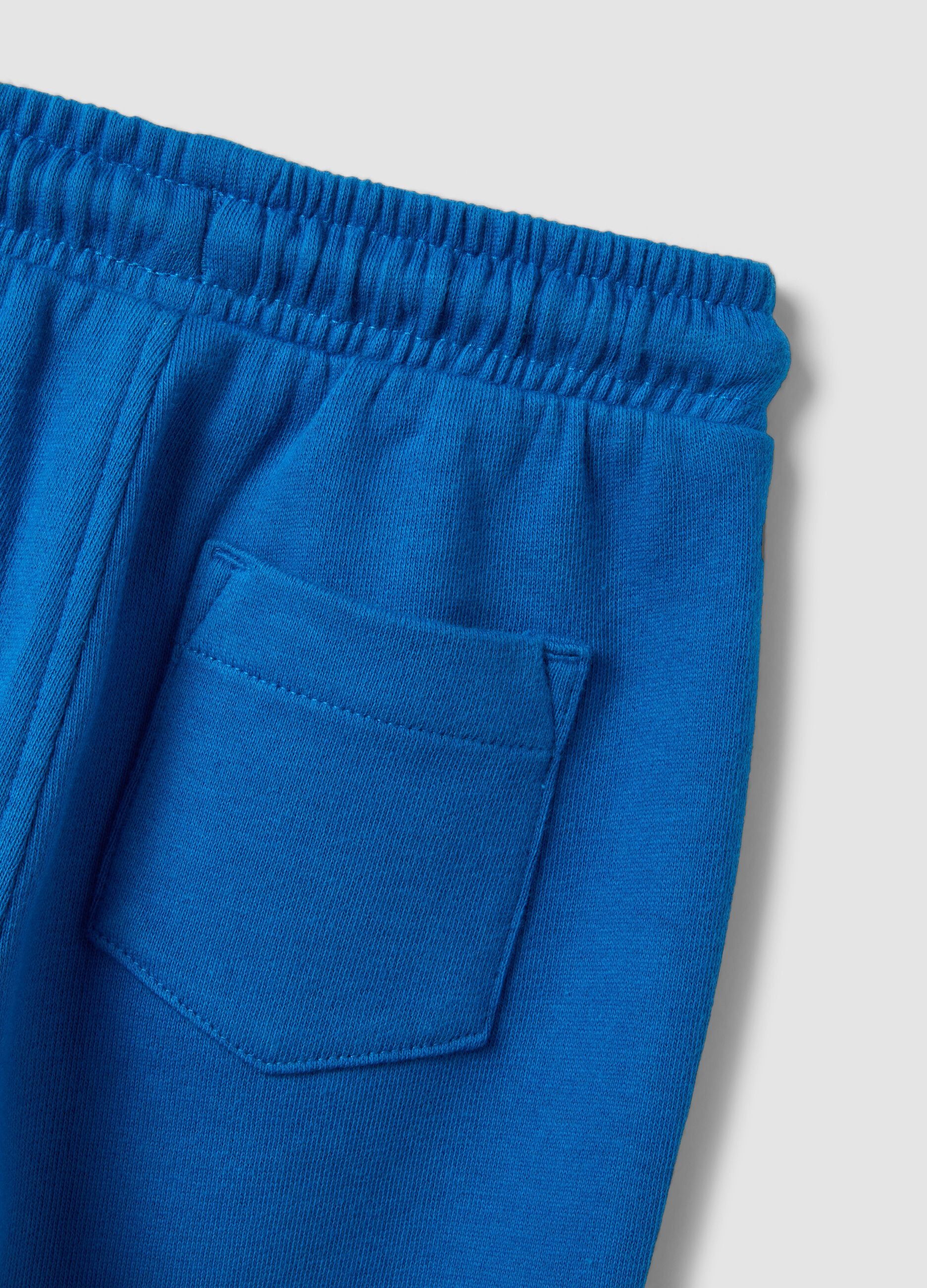 Blue organic cotton jogger trousers with drawstring for boys