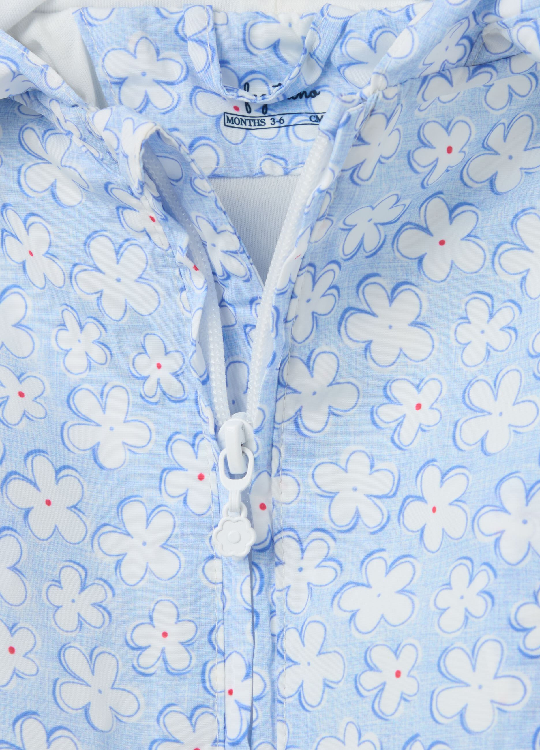 Waterproof jacket with hood and ditsy floral print