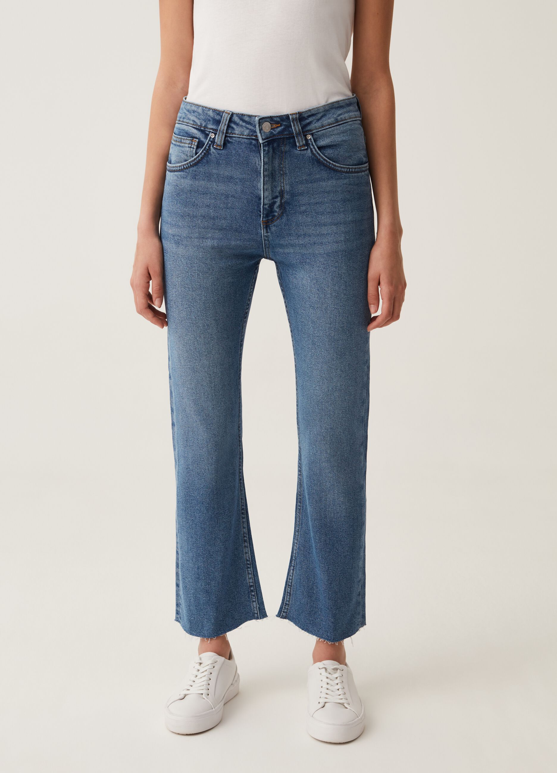 Flare-fit jeans with raw edging