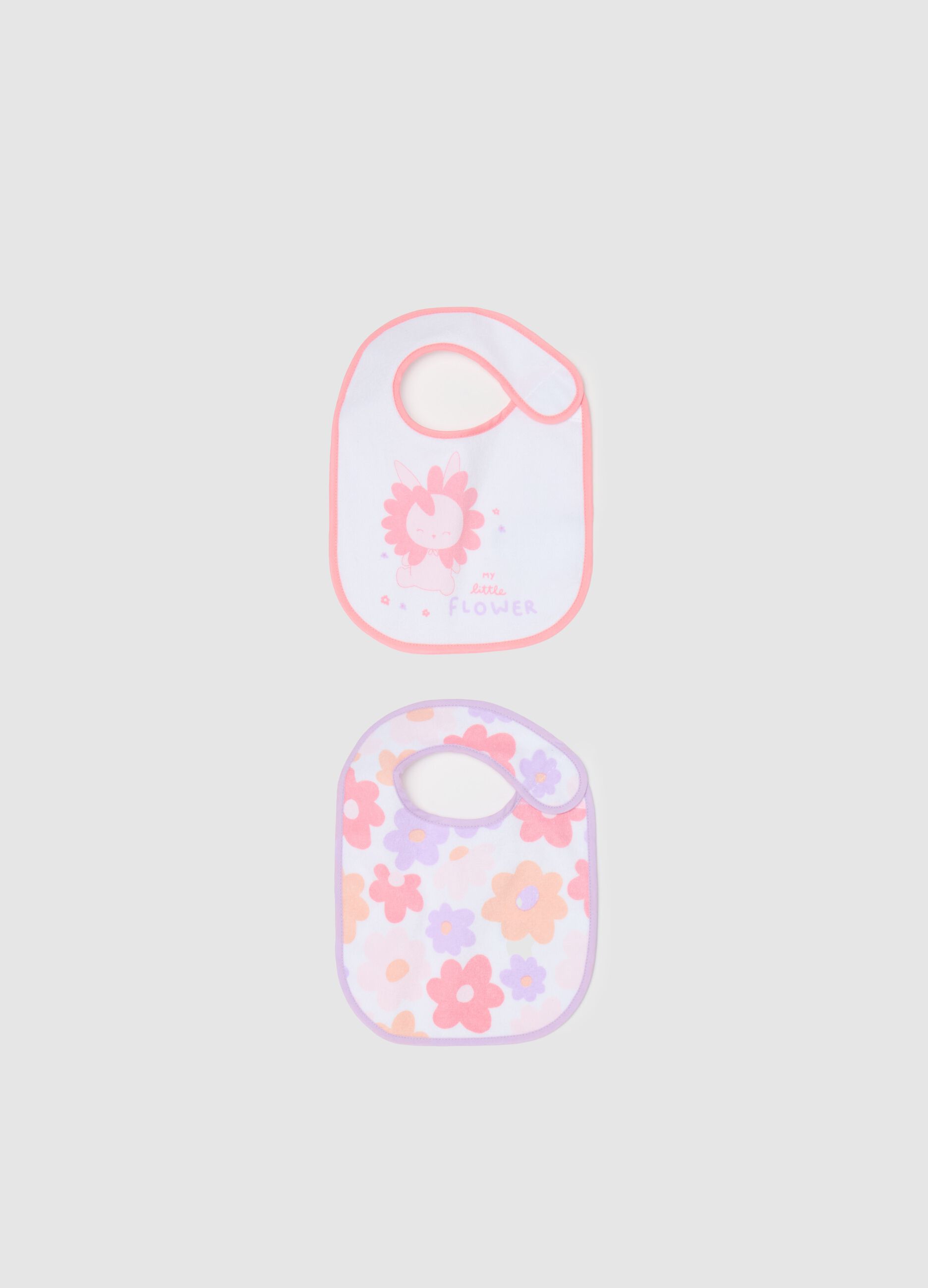 Two-pack bibs with PEVA backing and flowers print