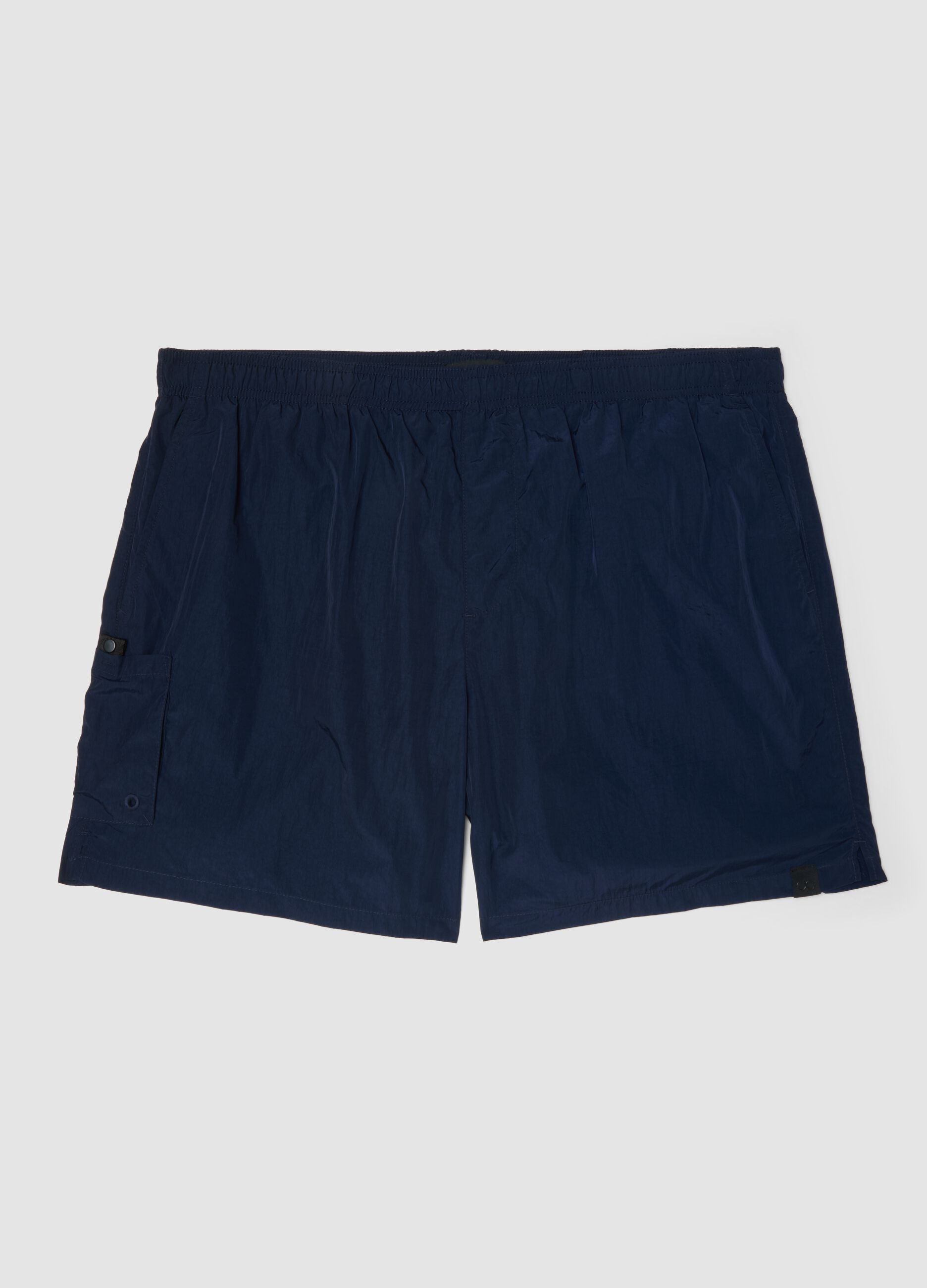 Blue swim shorts with elasticated waistband