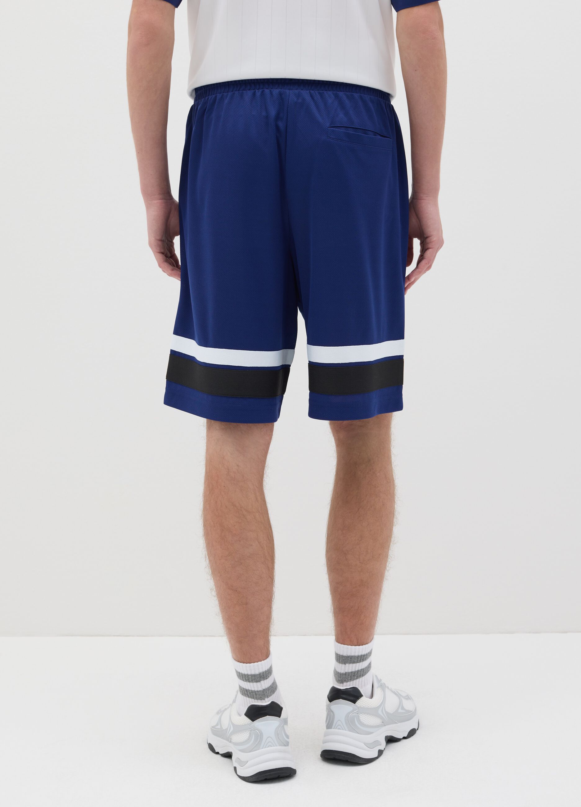 Blue Bermuda joggers with NFC print