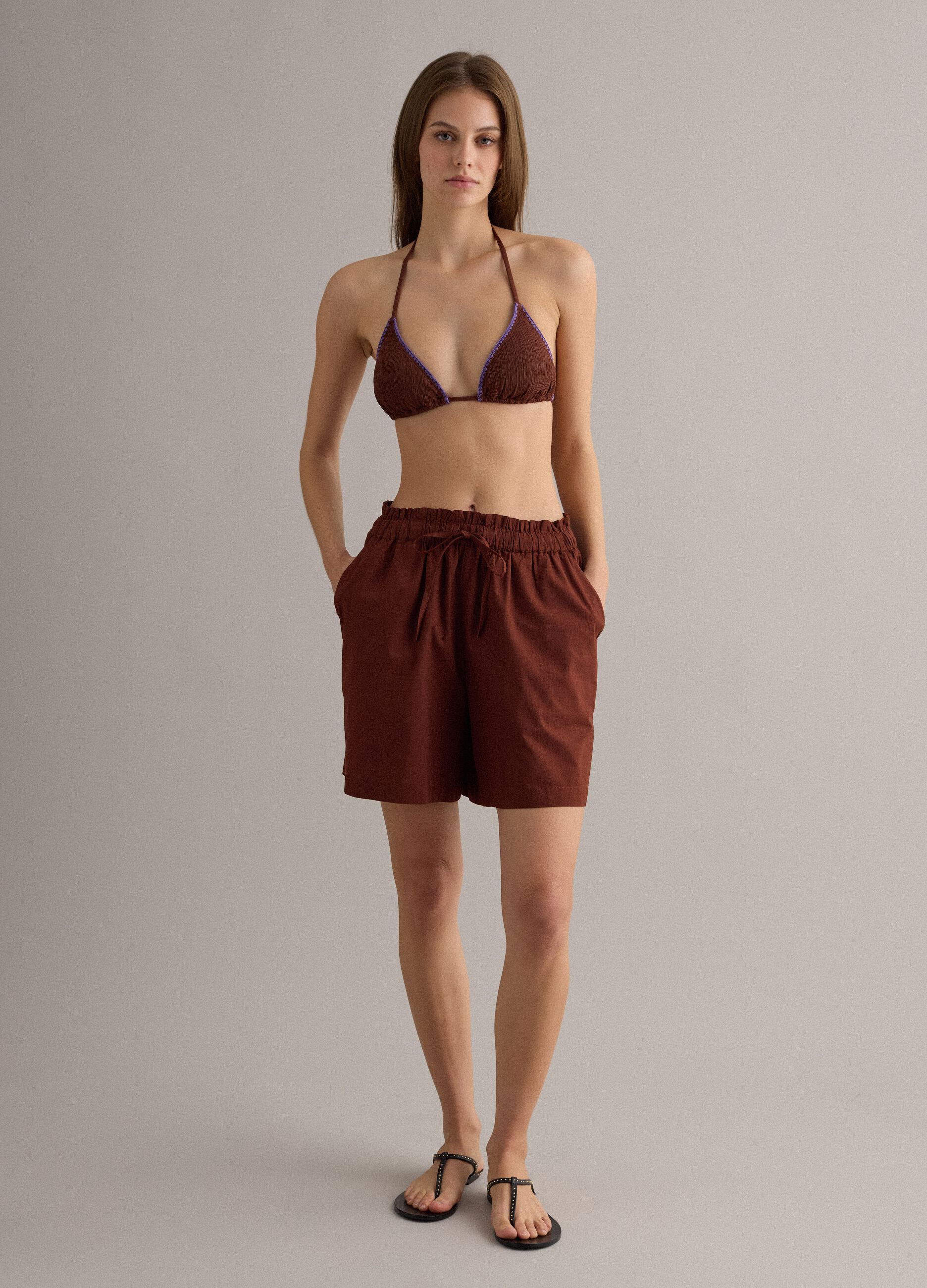 Brown triangle bikini top in stretch fabric with purple trim