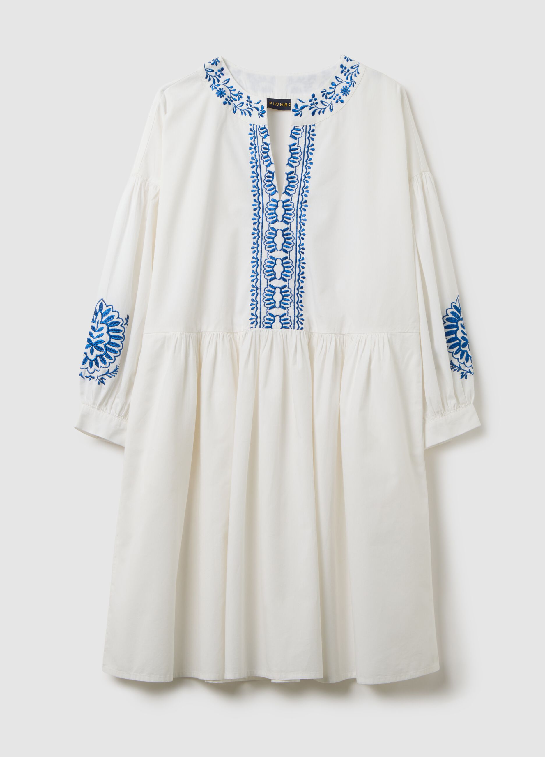 Vestito da donna in puro cotone bianco con ricami