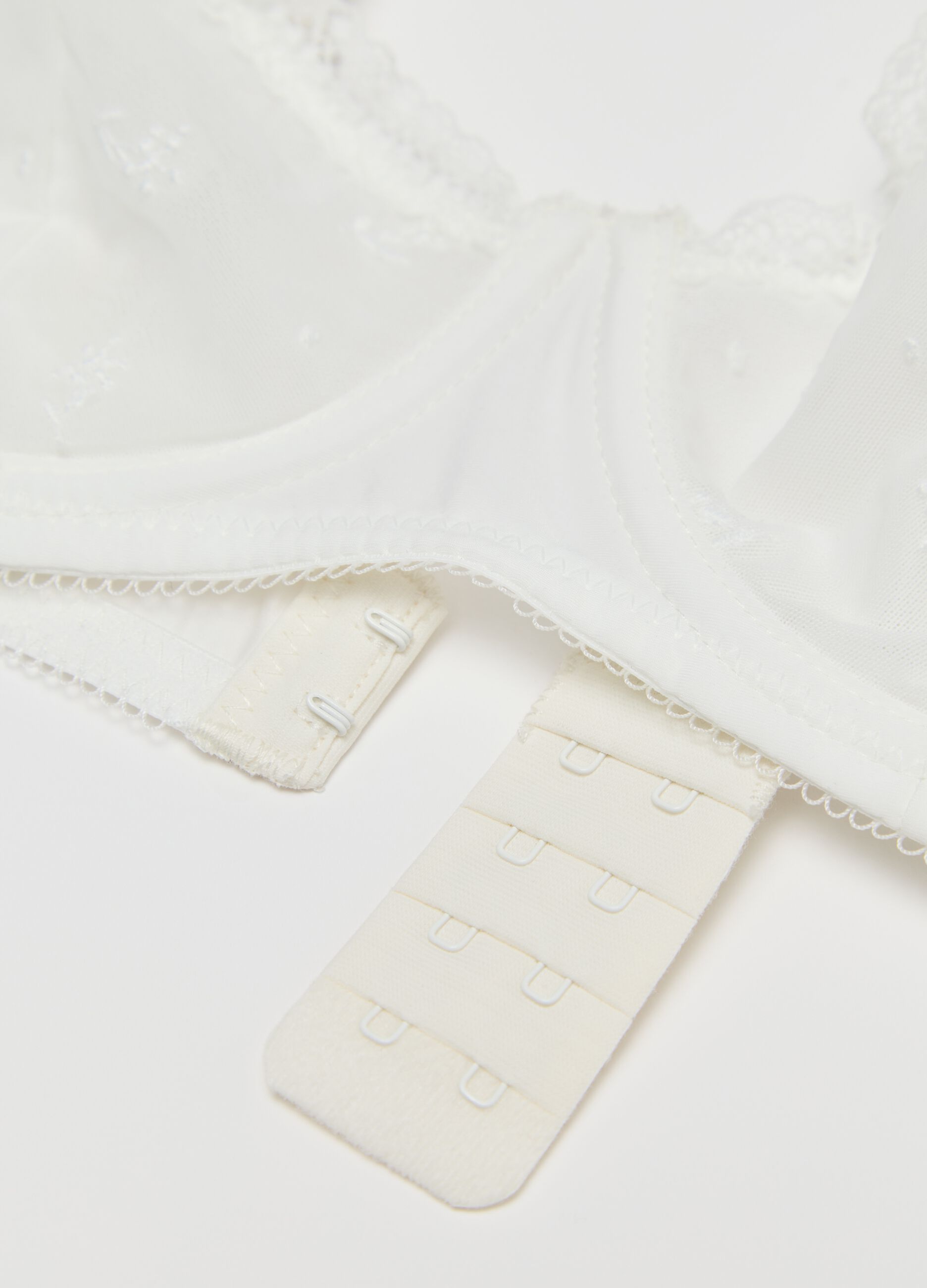 White balconette bra with foliage embroidery