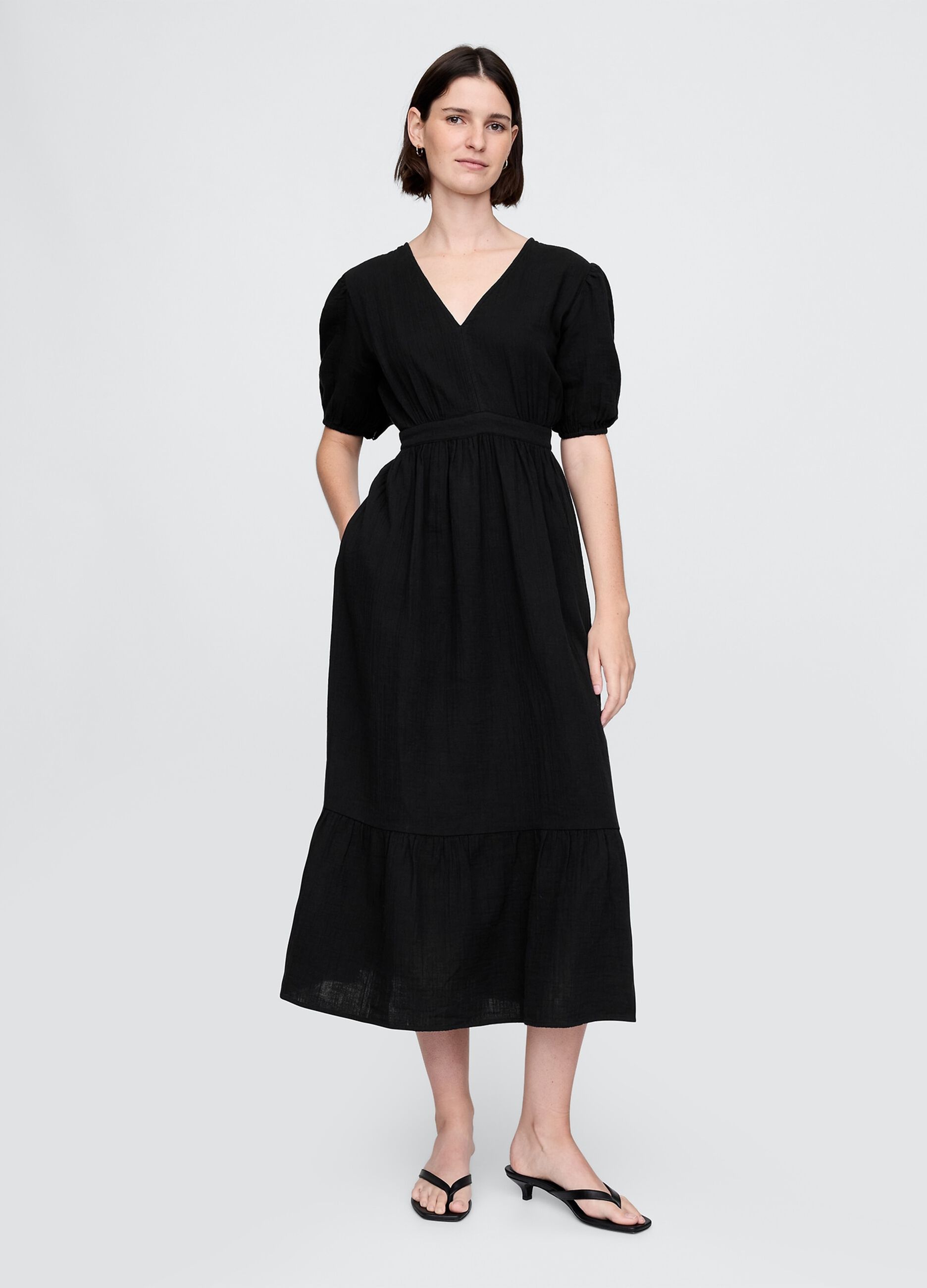 Long black dress with V-neck and open back