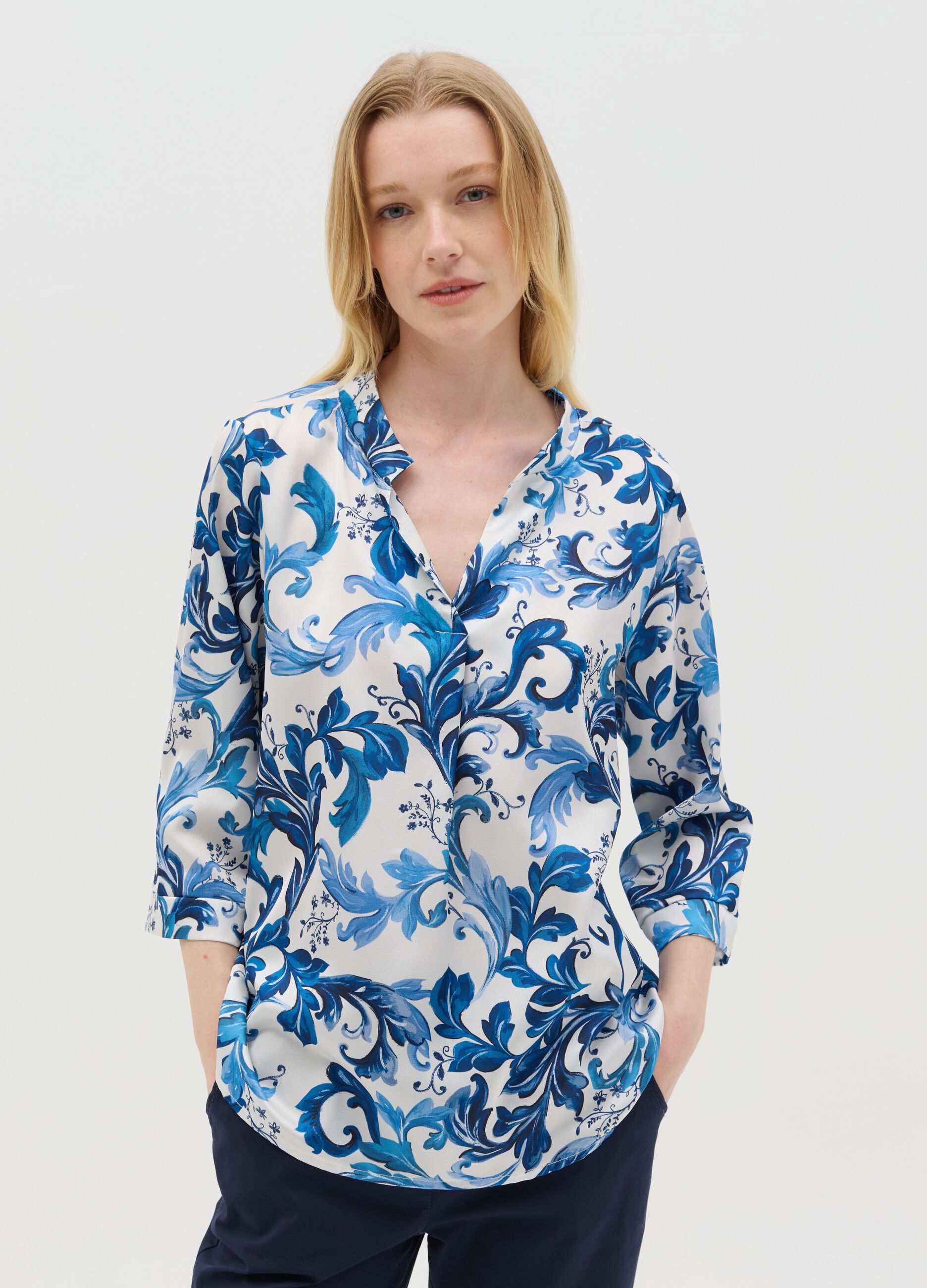 White and blue blouse with print