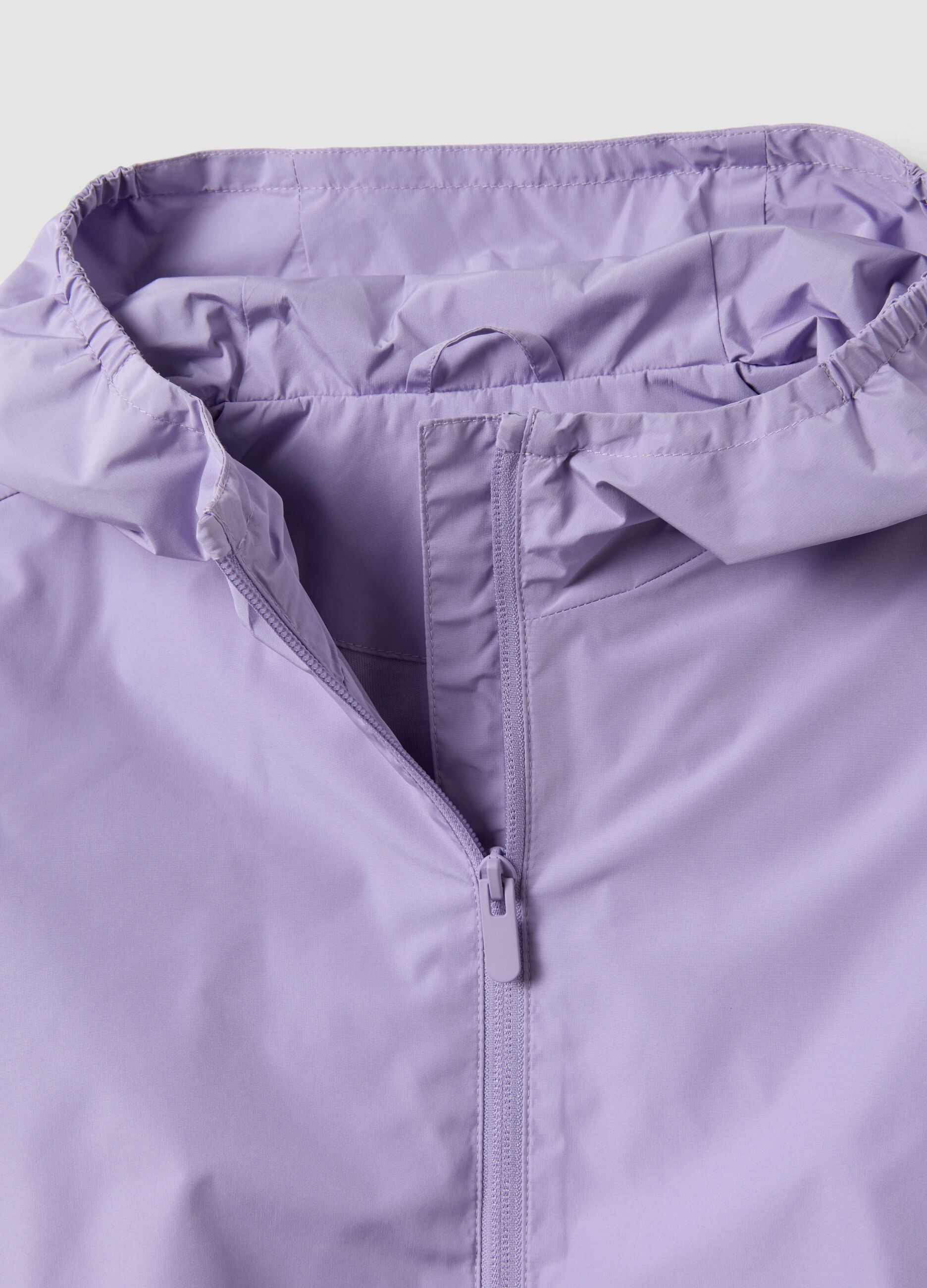 Purple hooded rain jacket with zip for girls