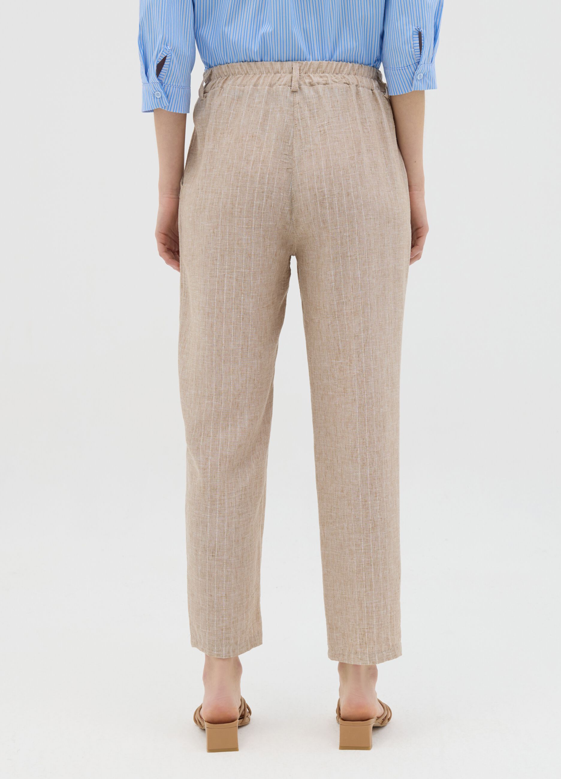 Beige trousers in stretch fabric