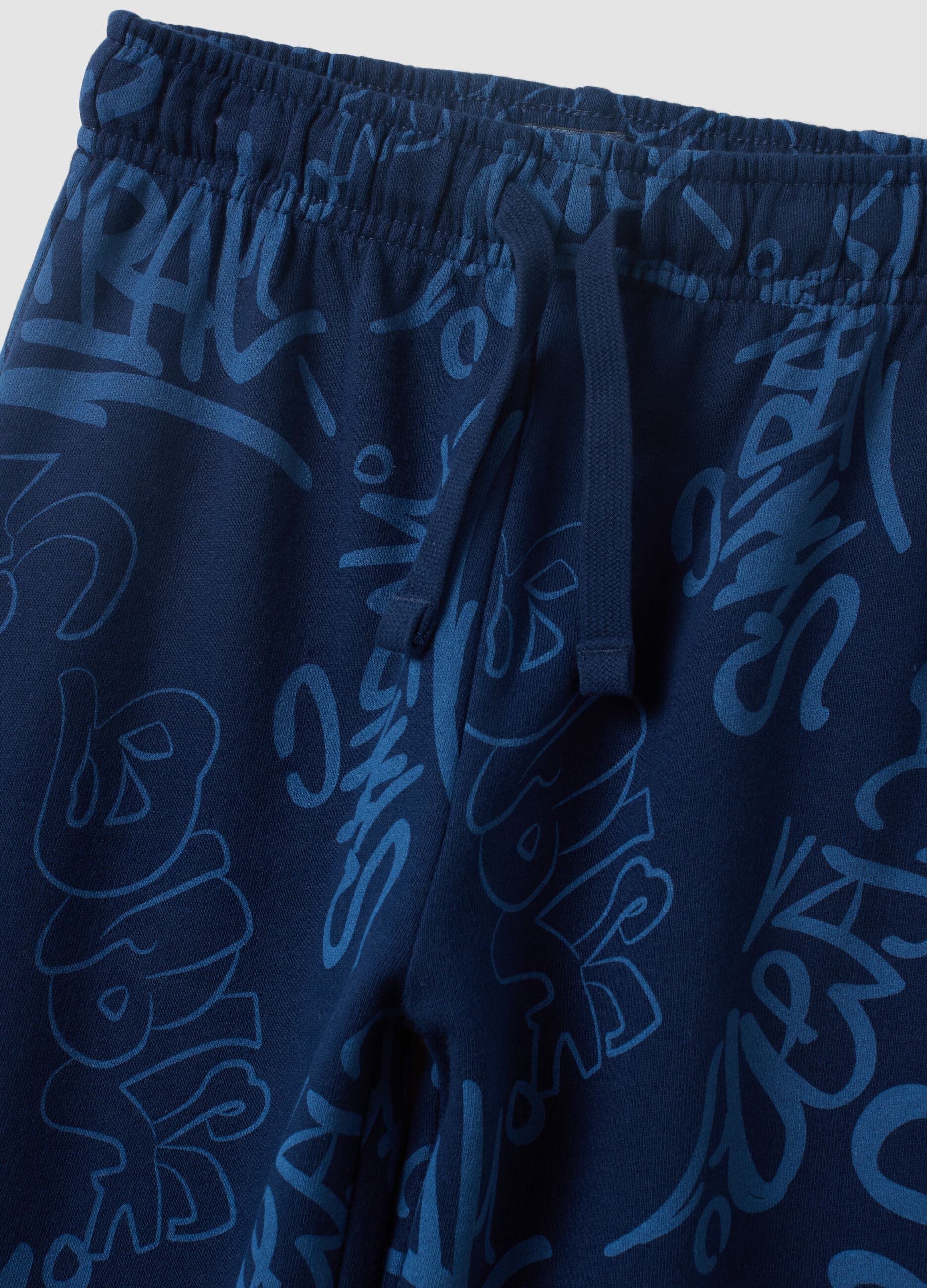 Blue oversized pure cotton all-over print jogger trousers for boys