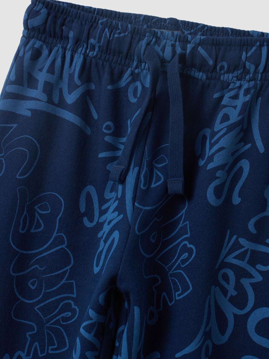Blue oversized pure cotton all-over print jogger trousers for boys_2