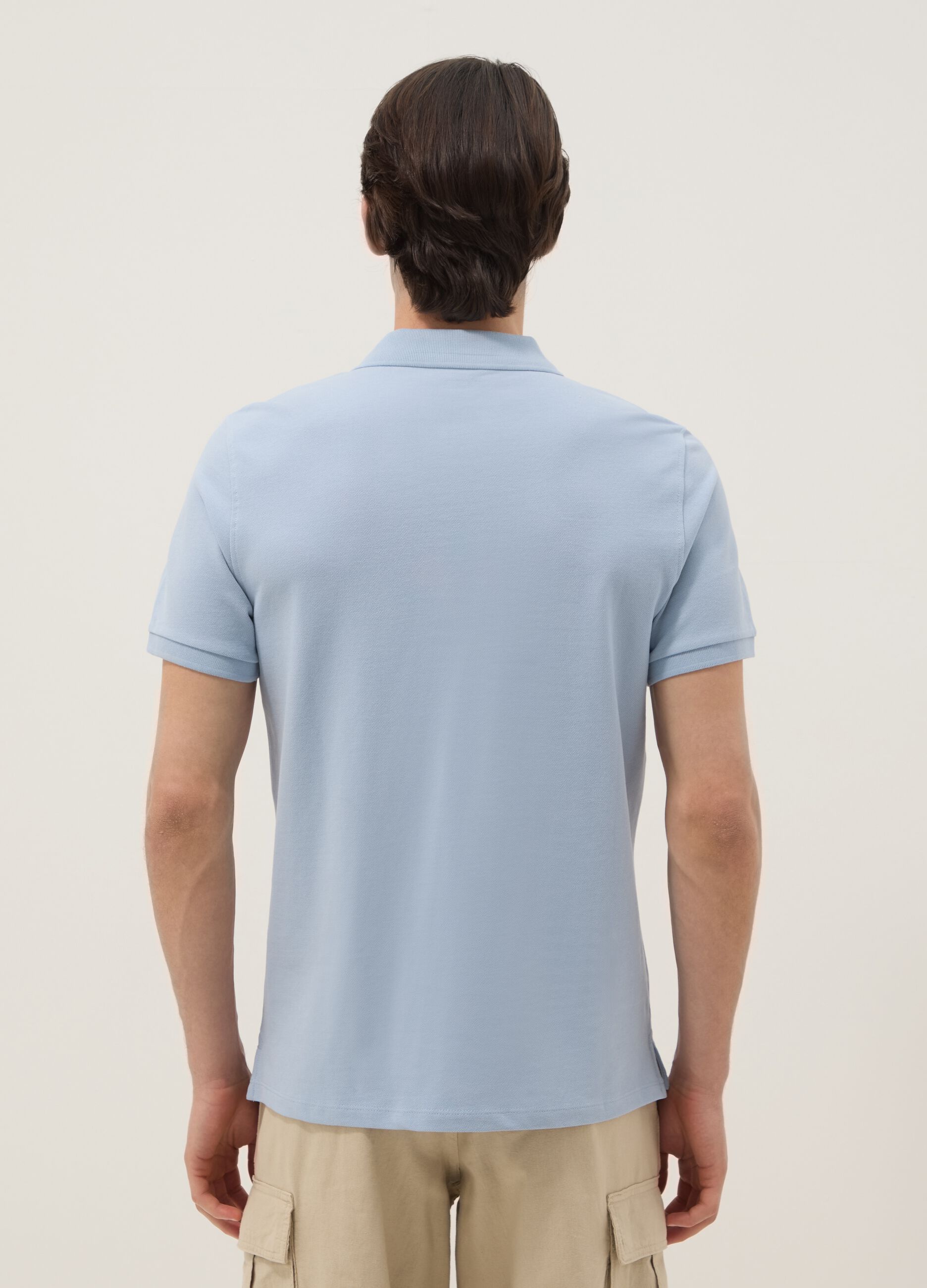 Light blue short-sleeve polo in pure organic cotton, regular fit
