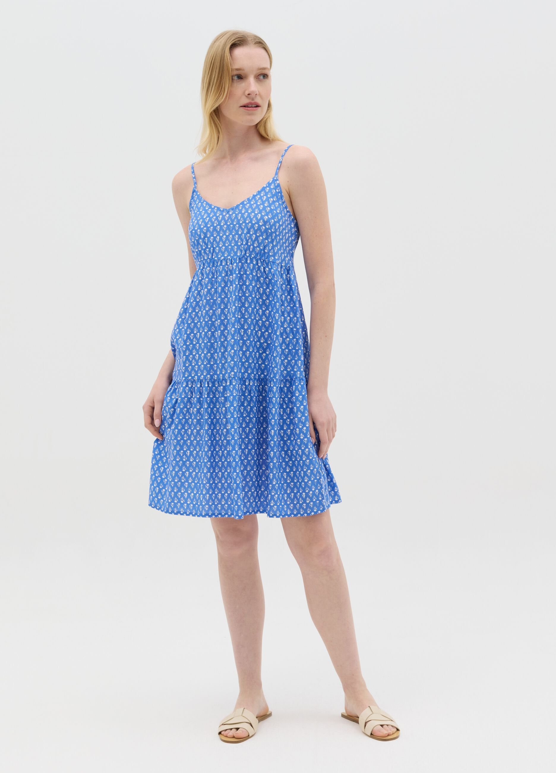 Light blue viscose dress with V neck and flounce
