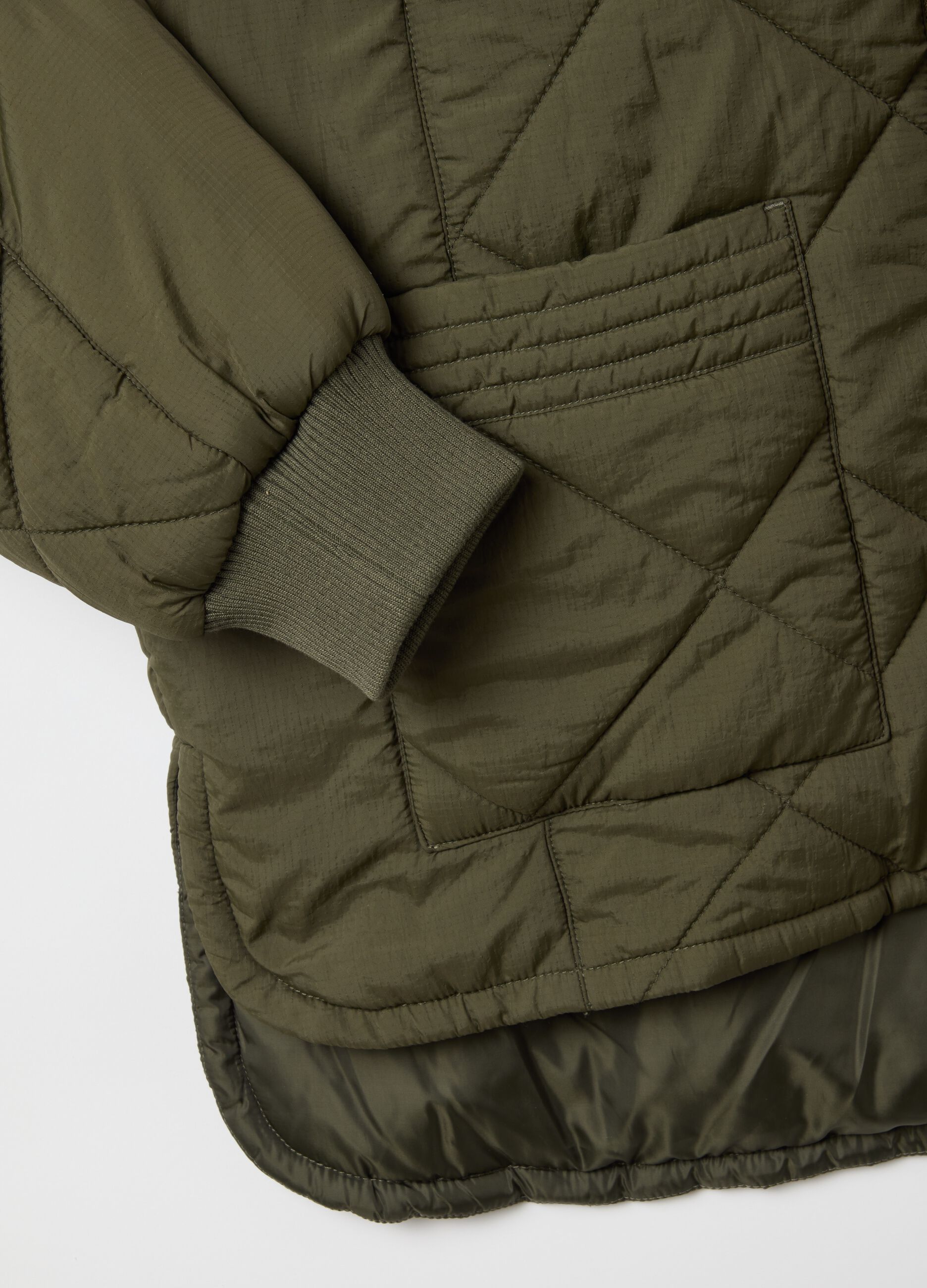 Green padded jacket with oversized fit