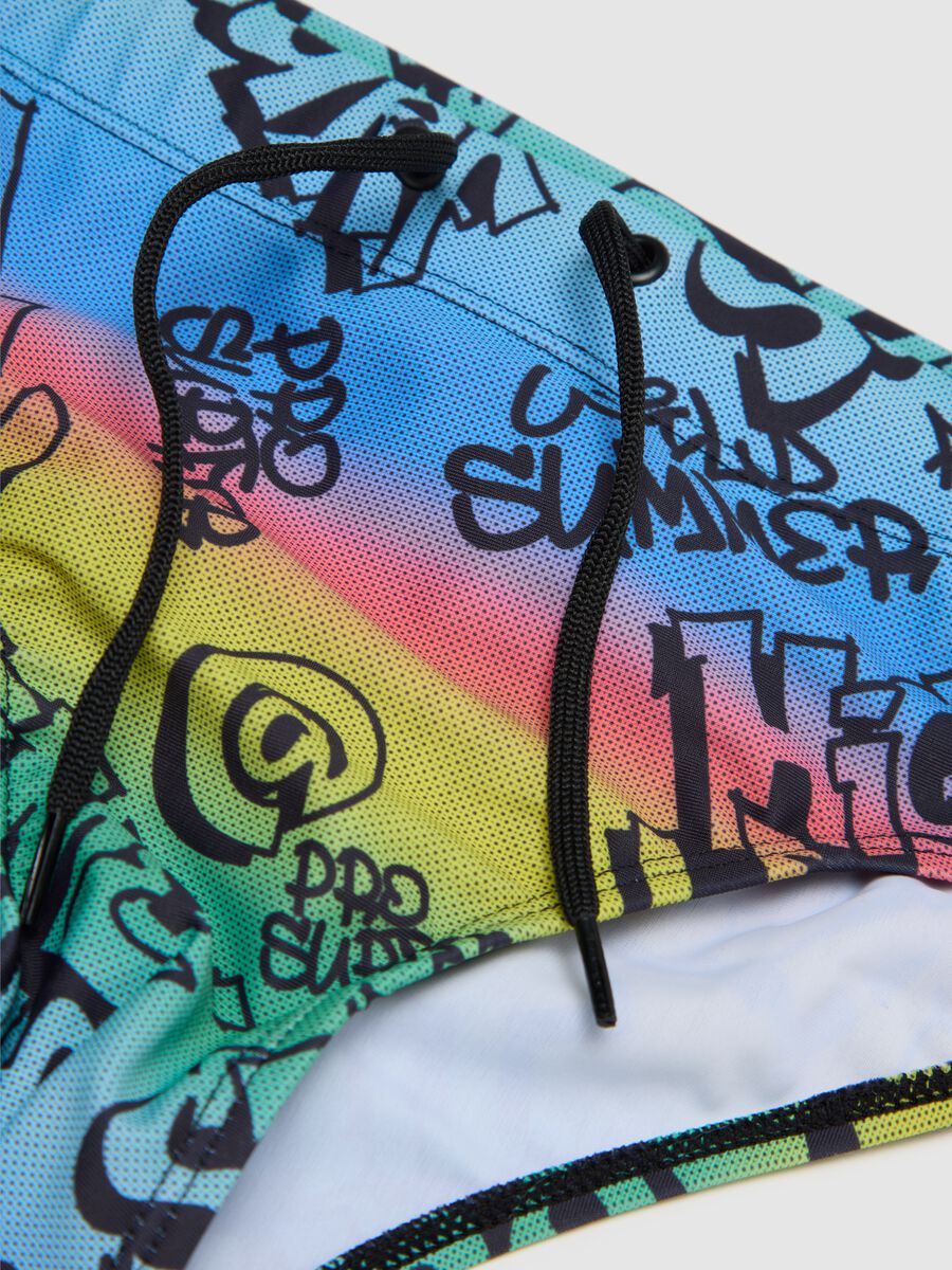 Boys’ swim briefs in multicoloured stretch fabric_2