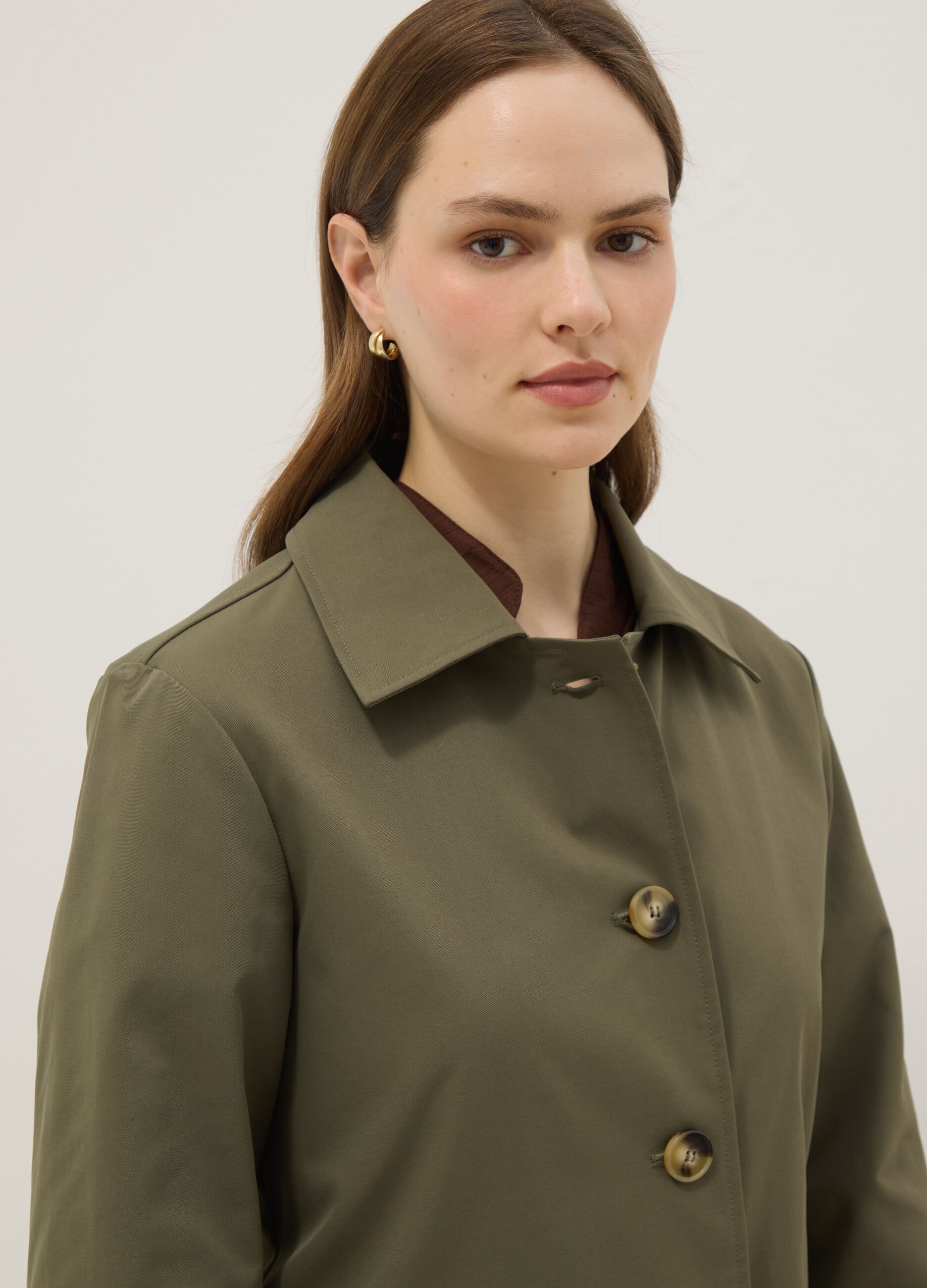 Green jacket with collar and buttons