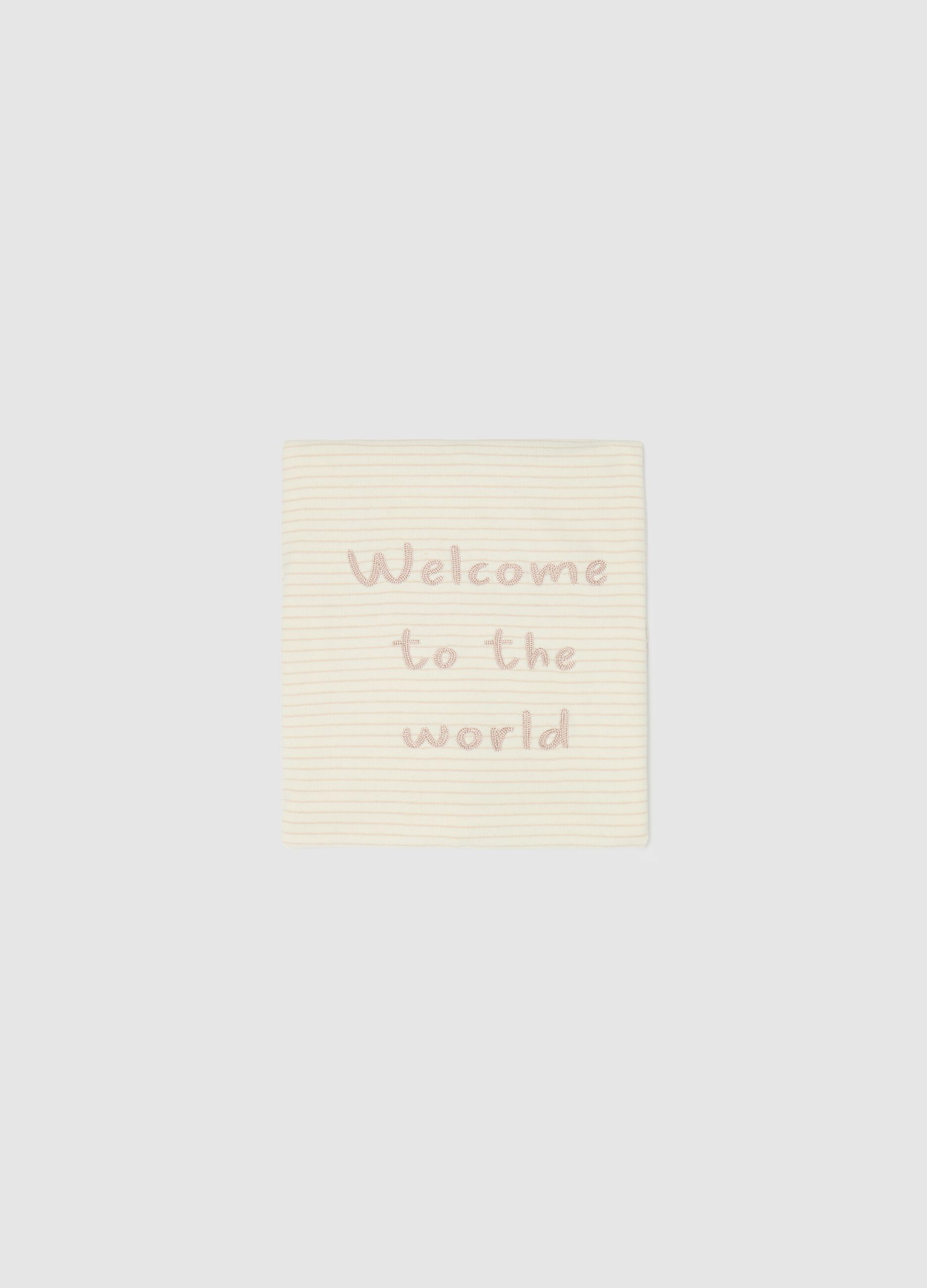 Blanket with "Welcome To The World" embroidery