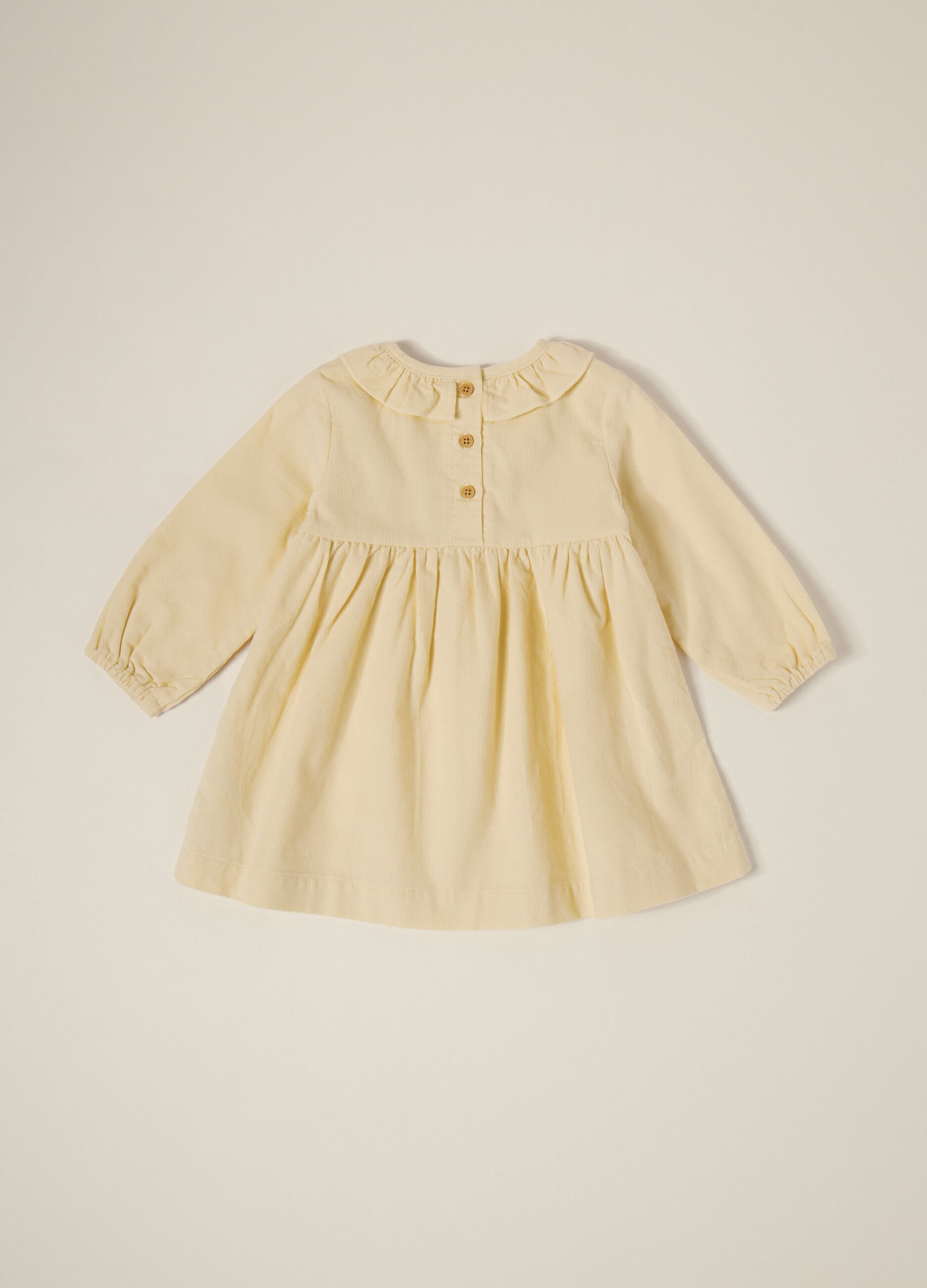 Beige corduroy dress with floral embroidery