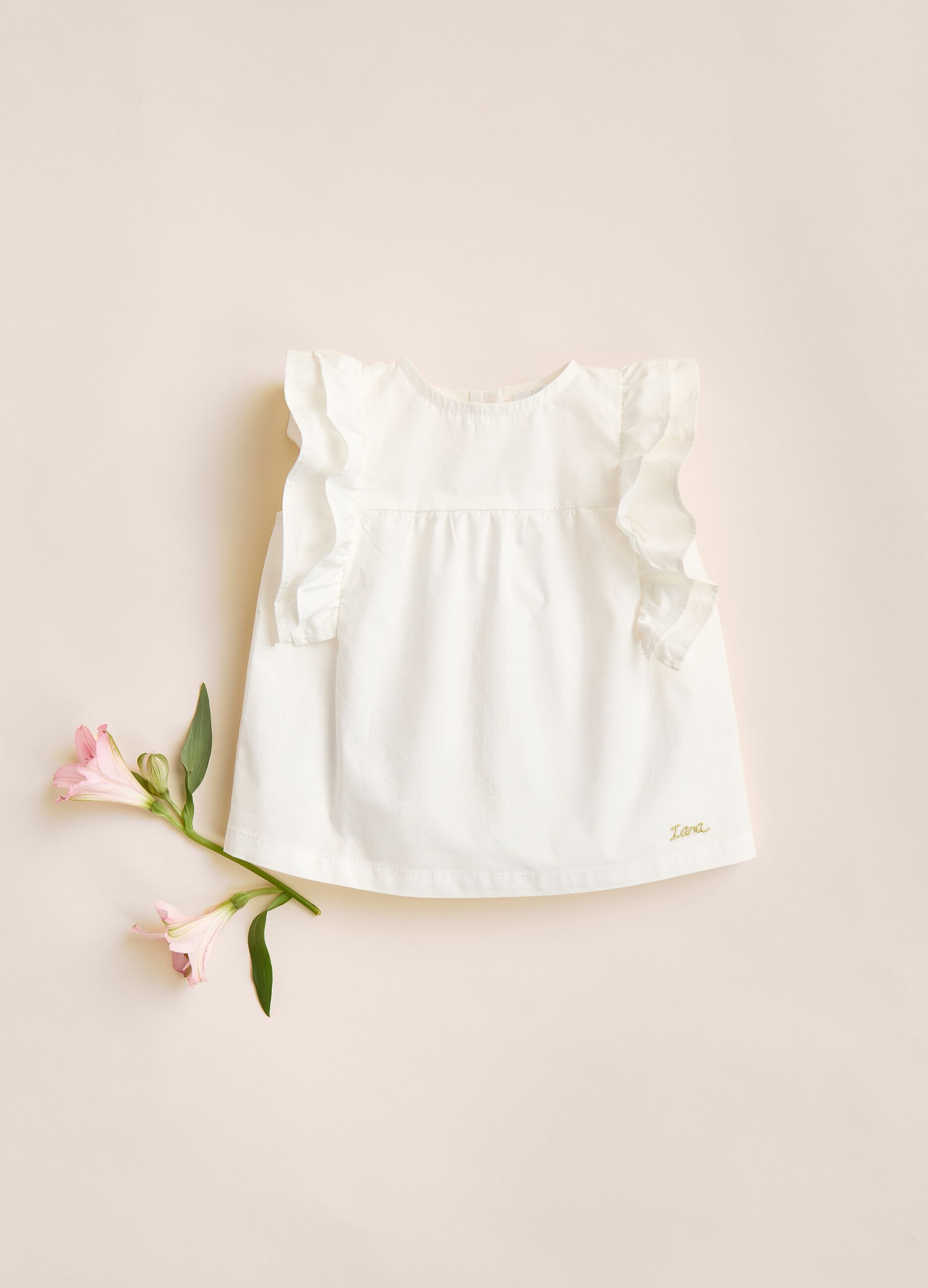 IANA 100% cotton sleeveless shirt with ruffles.