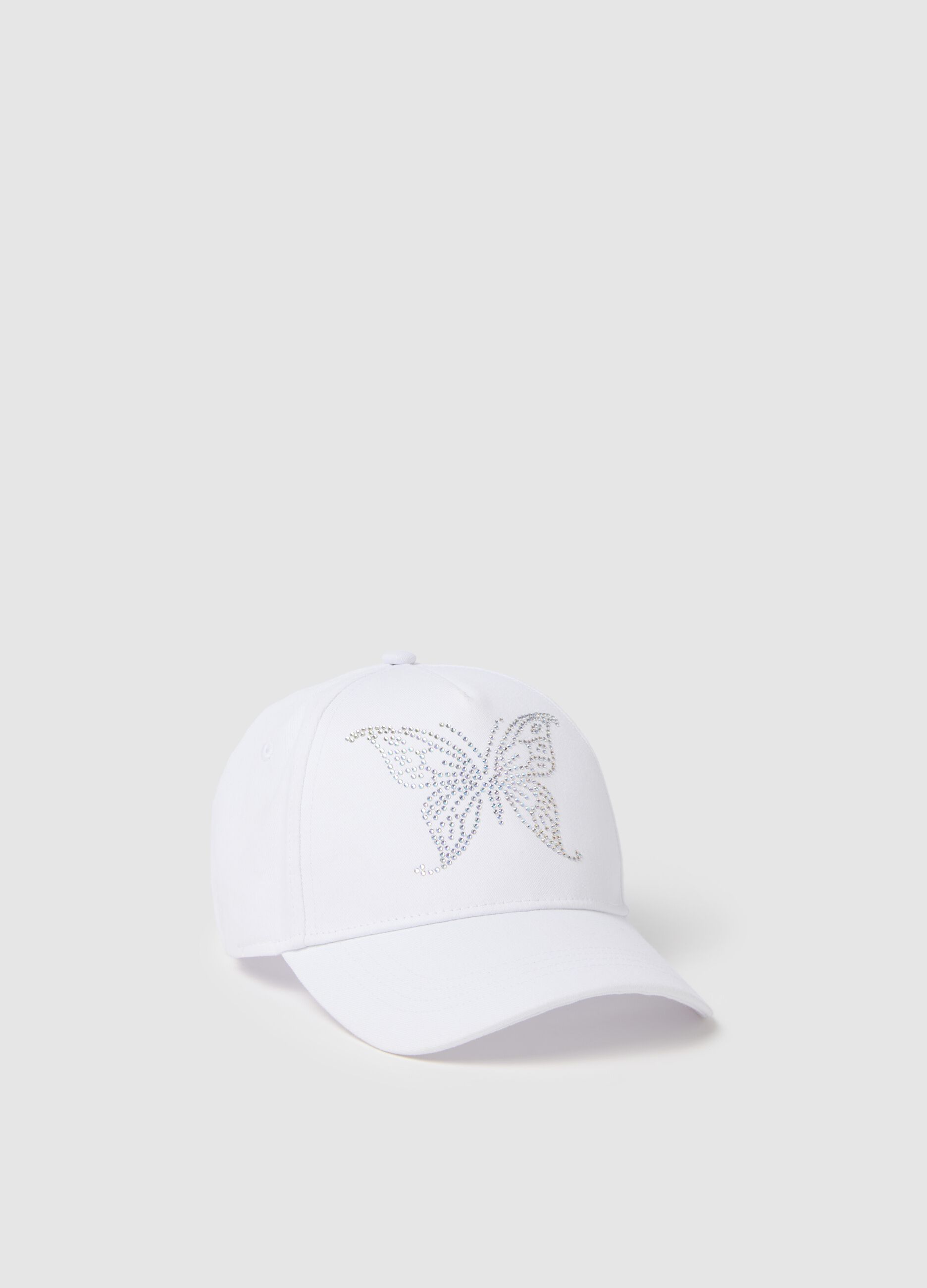 White baseball cap with butterfly embellishment
