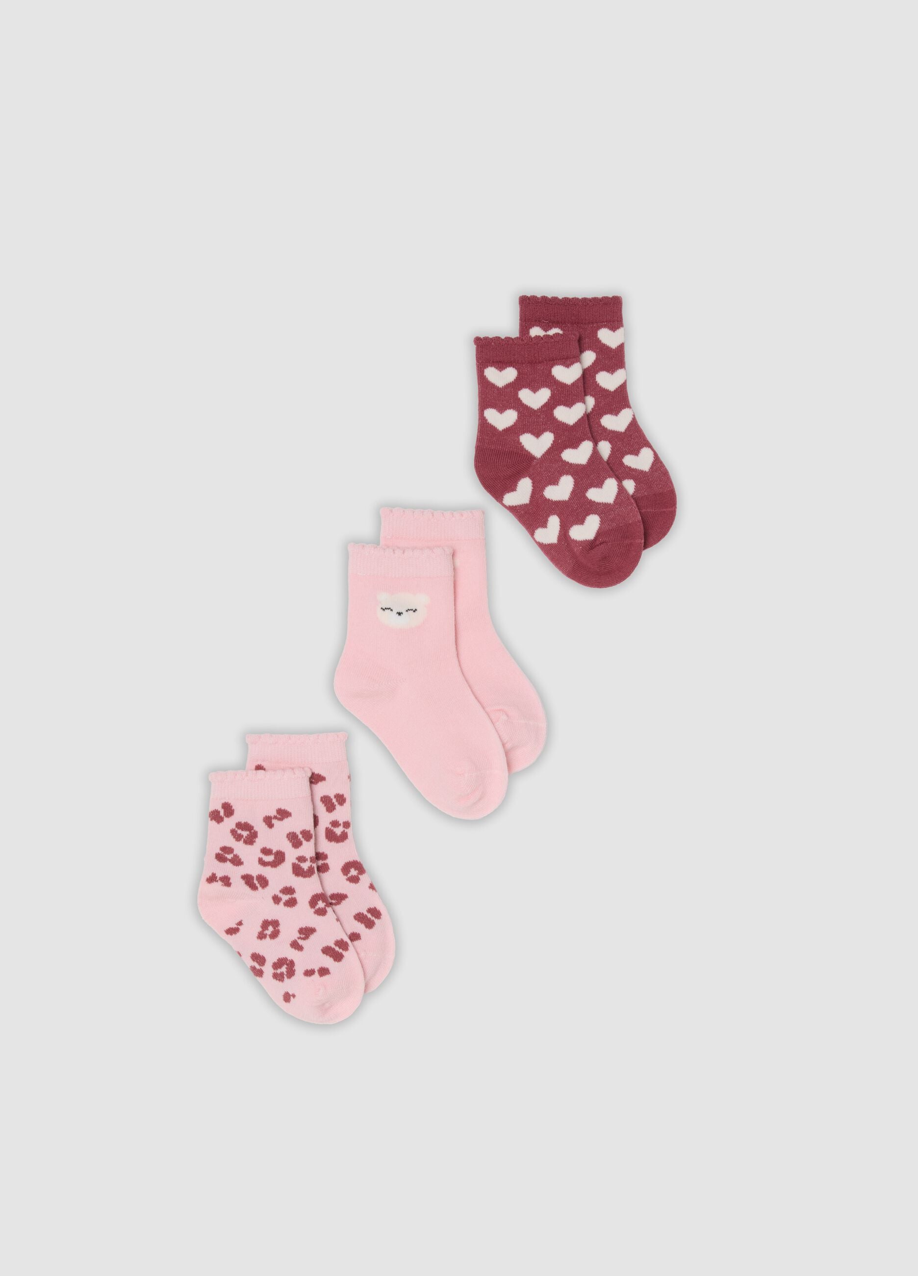 Tripack di calze rosa e rosse in cotone organico elasticizzato con fantasia