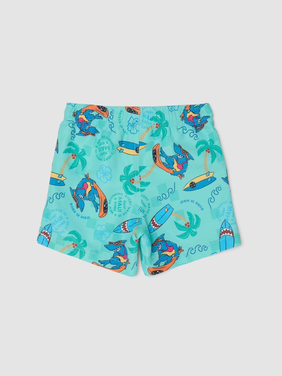 Blue boys&rsquo; swim shorts with tropical print_1