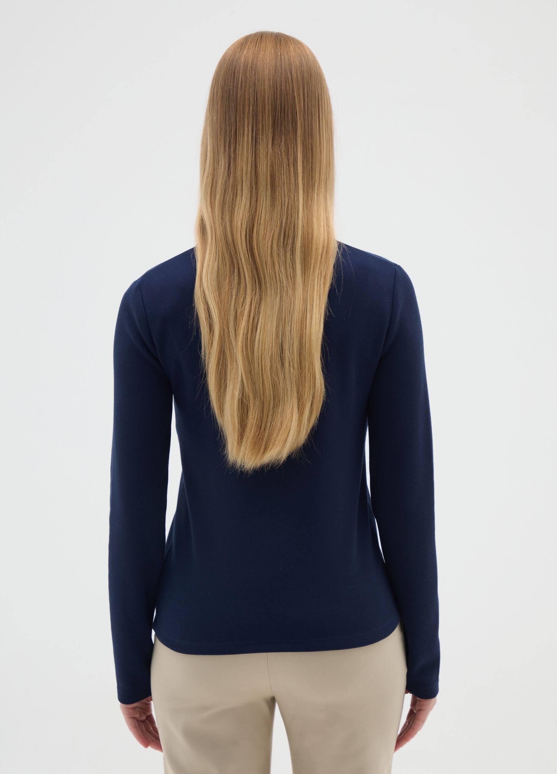 Polo blu a maniche lunghe elasticizzata