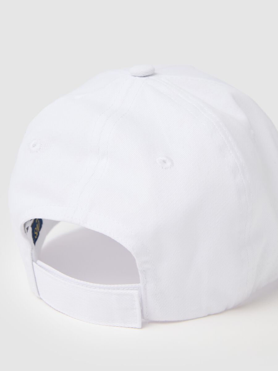 White baseball cap with butterfly embellishment_1