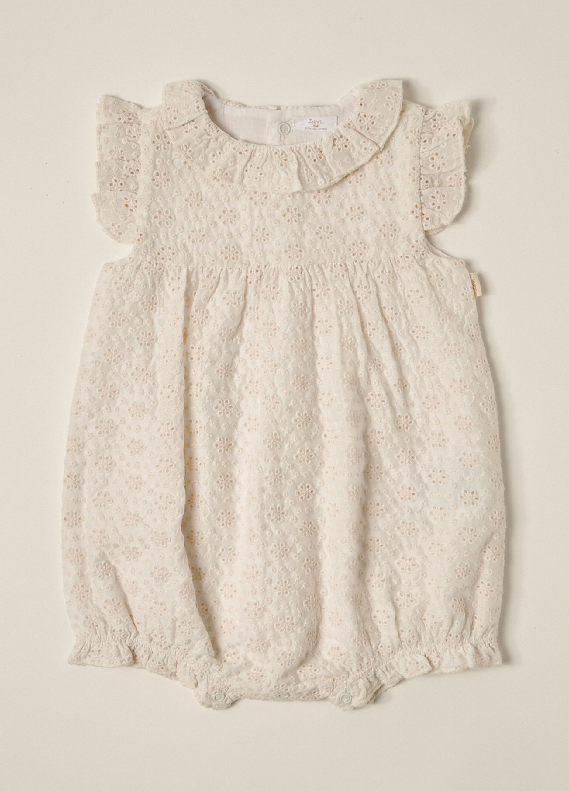 IANA newborn girl romper suit in broderie anglaise
