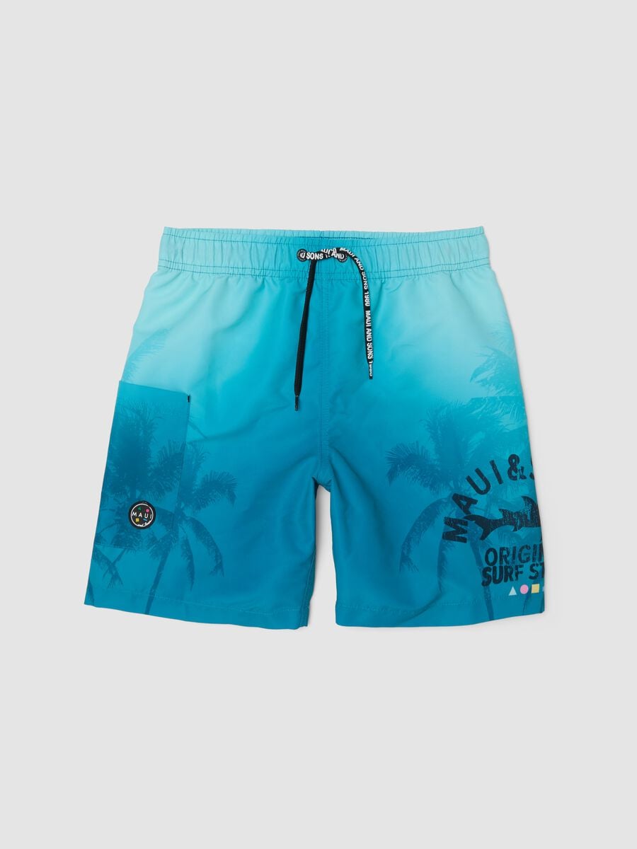 Blue tropical-print swim shorts_0