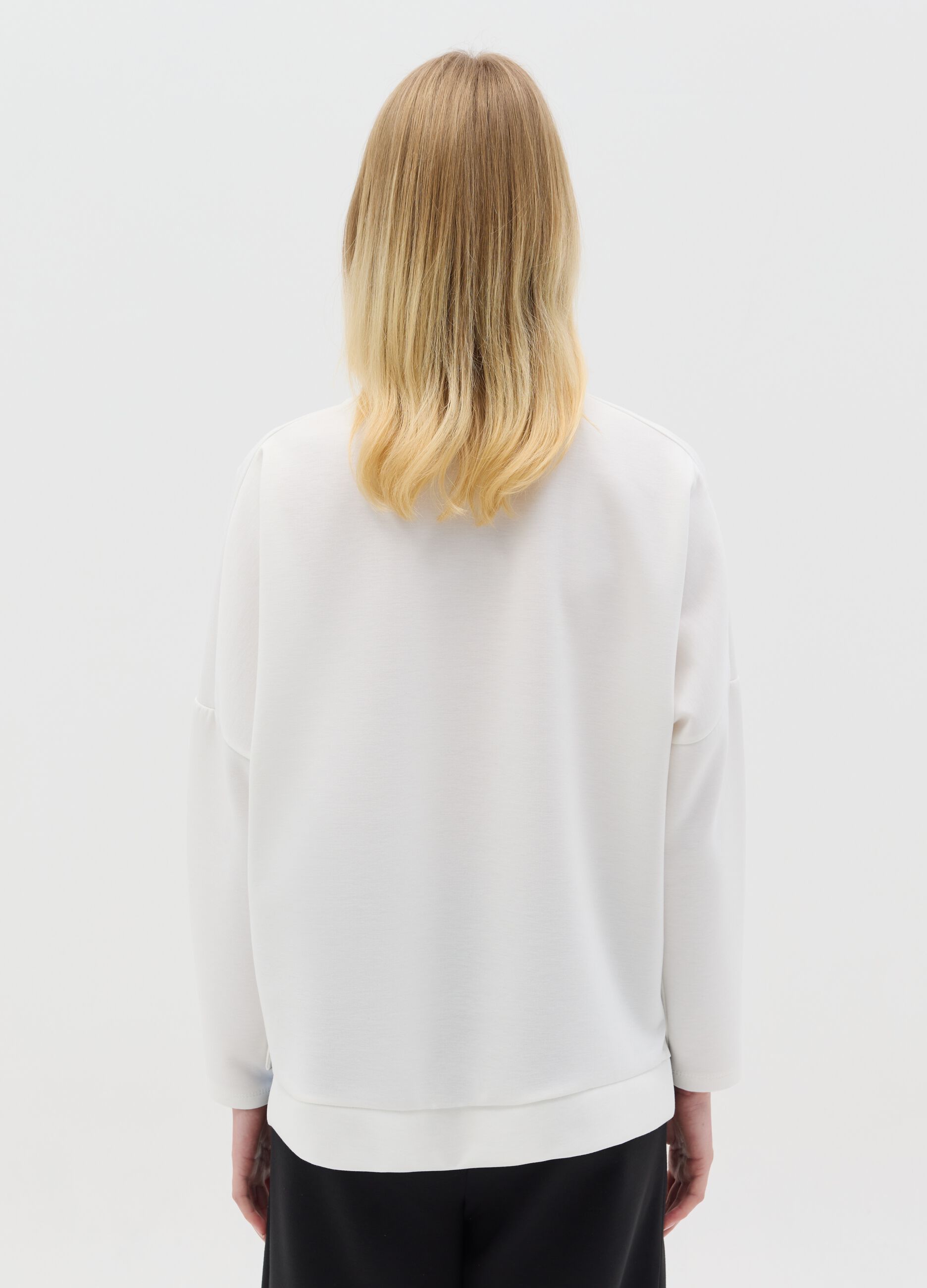 White top with layered-effect hem