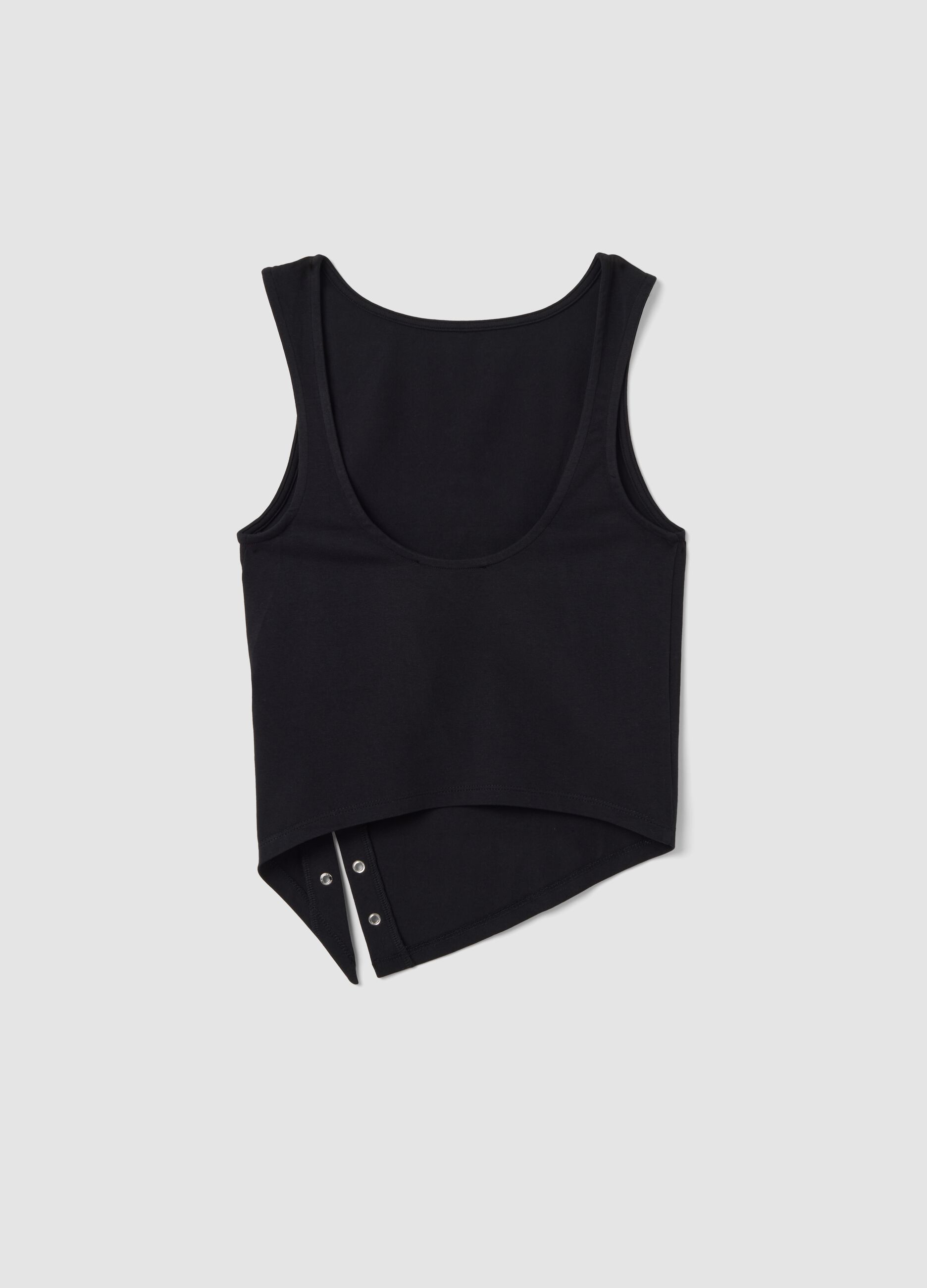 Black stretch cotton top with asymmetric hem and metal eyelets