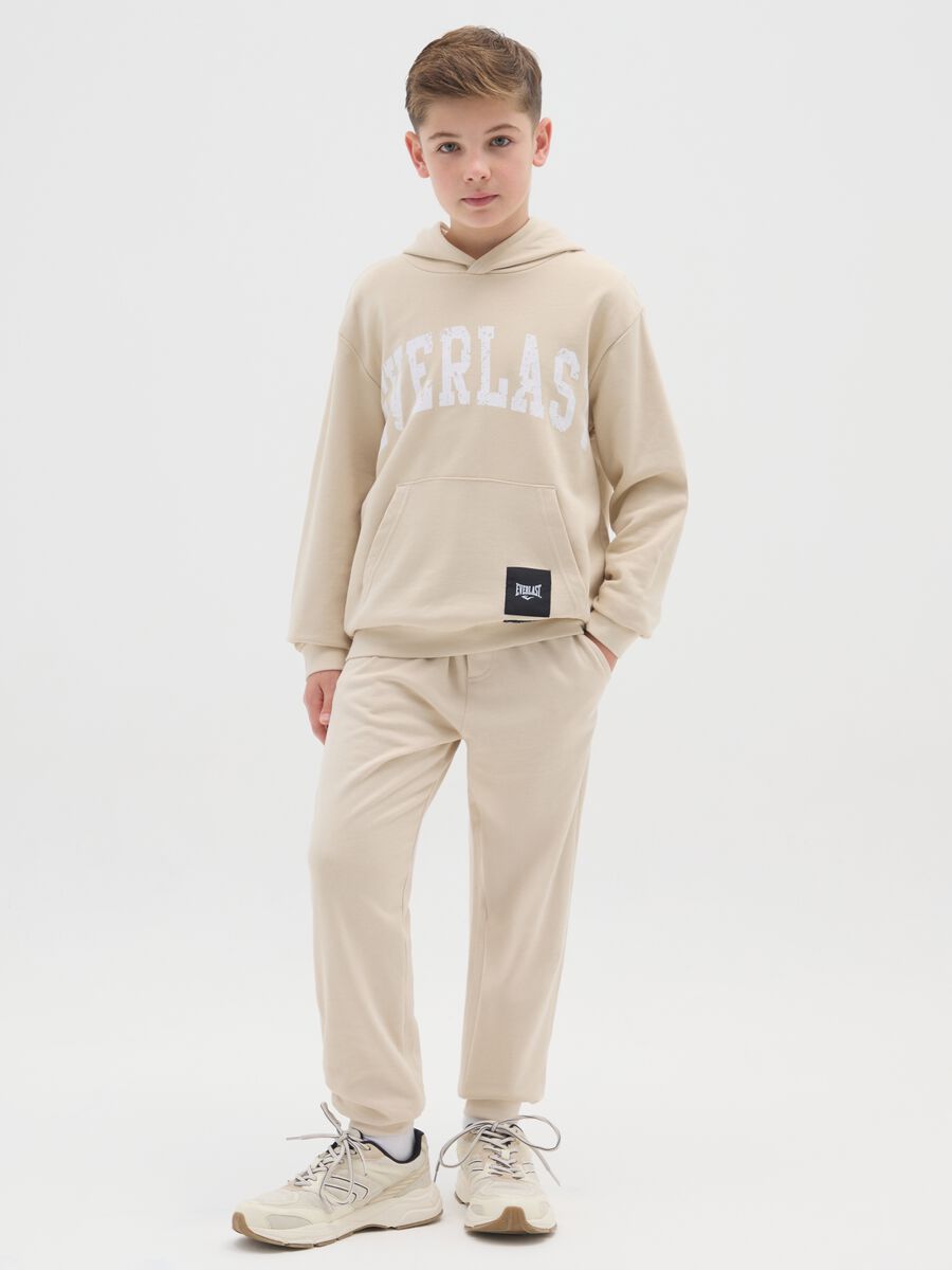 Boys' beige cotton blend over fit trousers_0