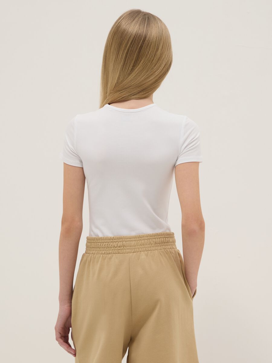 Girl's fitted white stretch cotton bodysuit_1