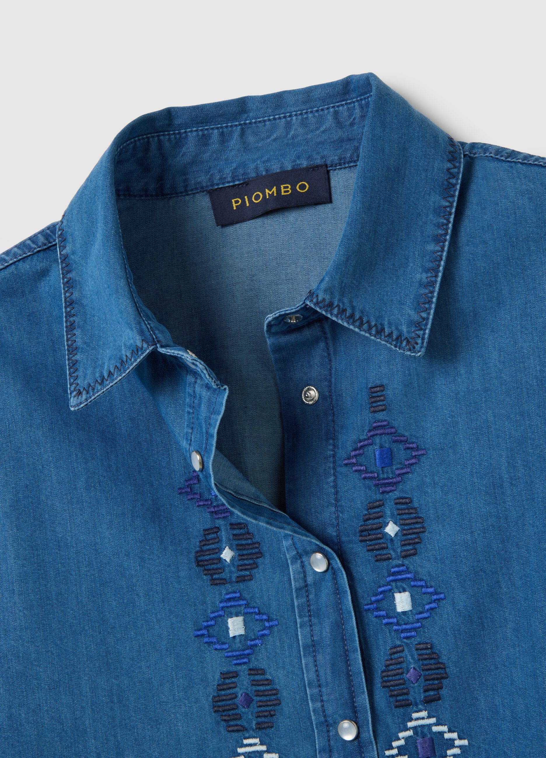 Blue cotton shirt with geometric embroidery