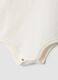 Body bianco in puro cotone organico con ricami floreali per neonata_2