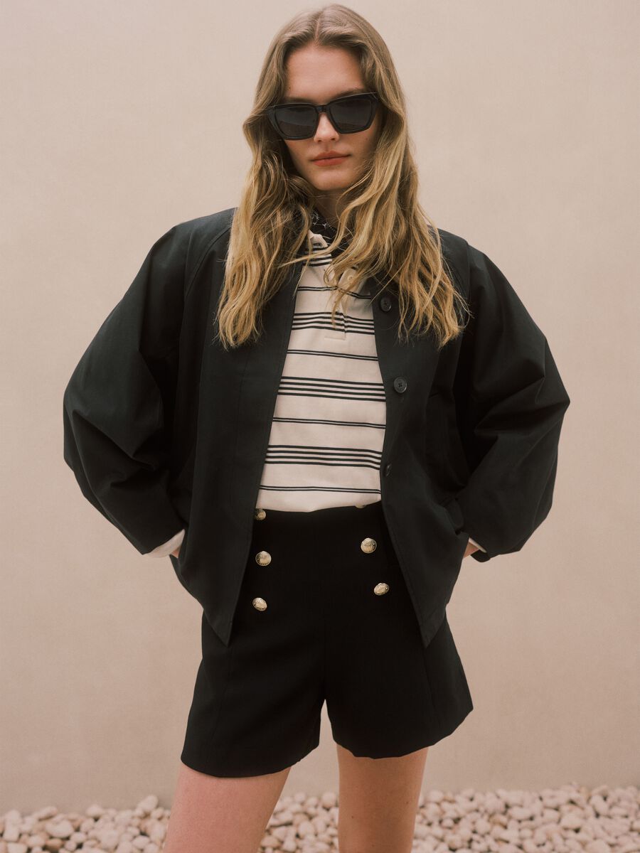 Black oversized cotton blend jacket with hidden closure_0