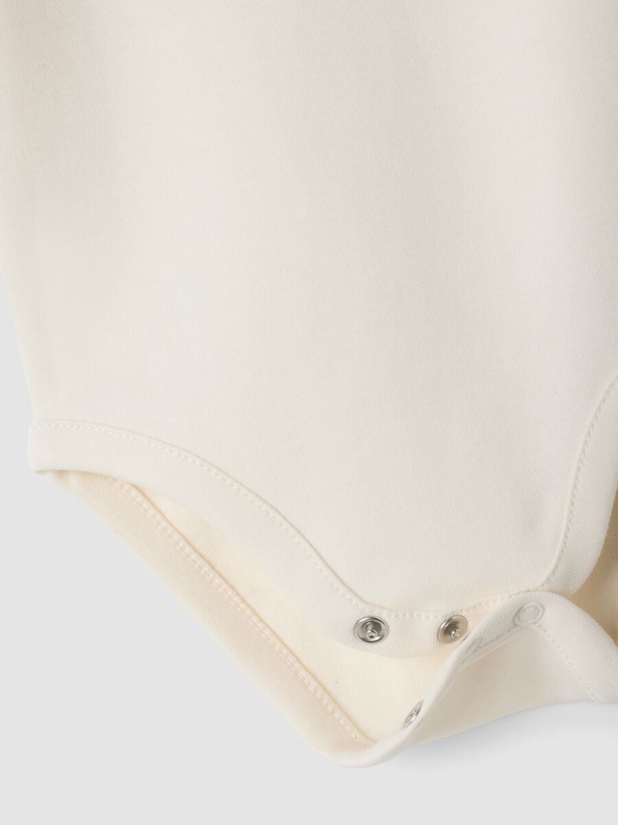 3-pack ivory and light pink organic cotton crew-neck bodysuits_2