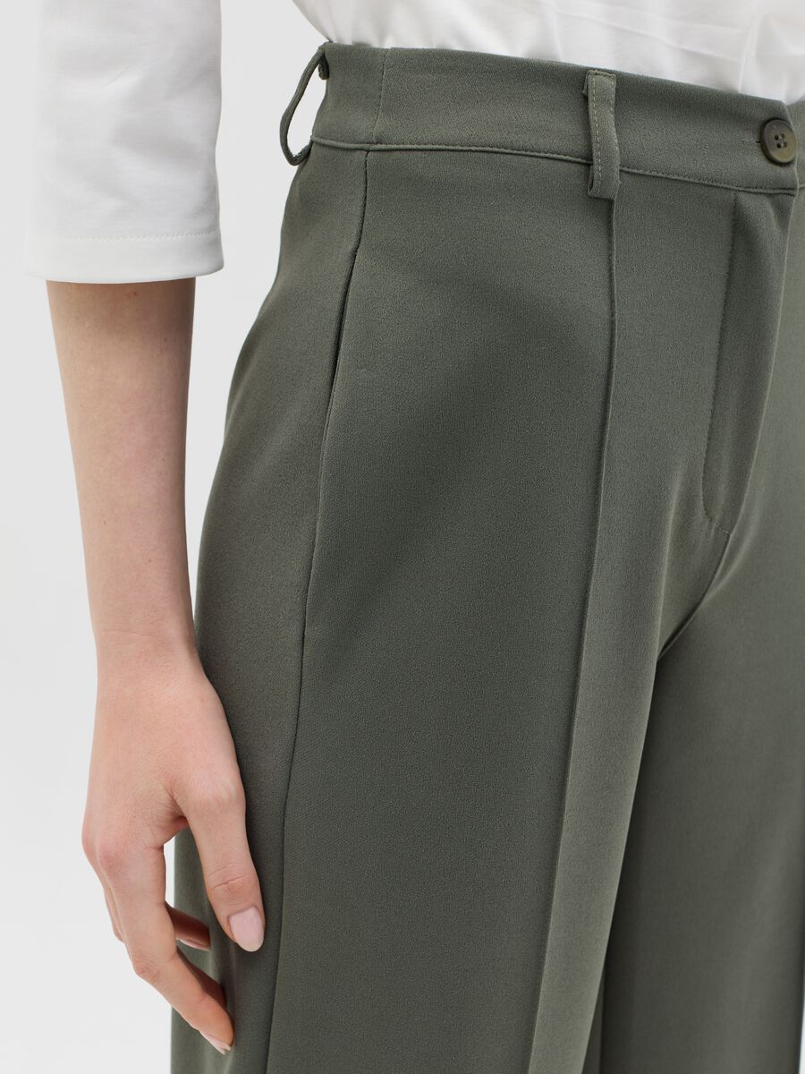 Green palazzo trousers with pockets_2